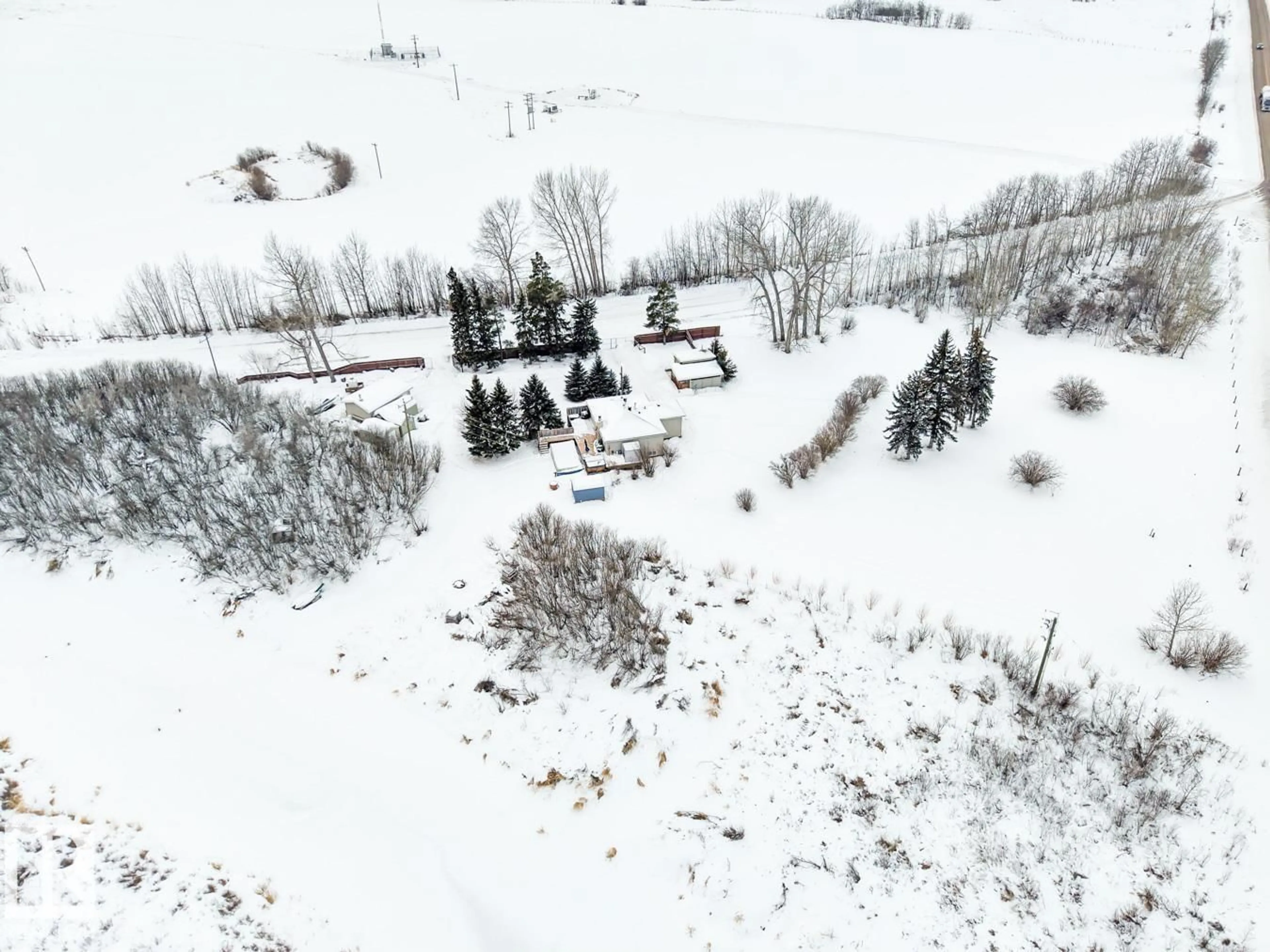 A pic from outside/outdoor area/front of a property/back of a property/a pic from drone, unknown for 57332 RGE ROAD 213A, Rural Sturgeon County Alberta T0A2W0