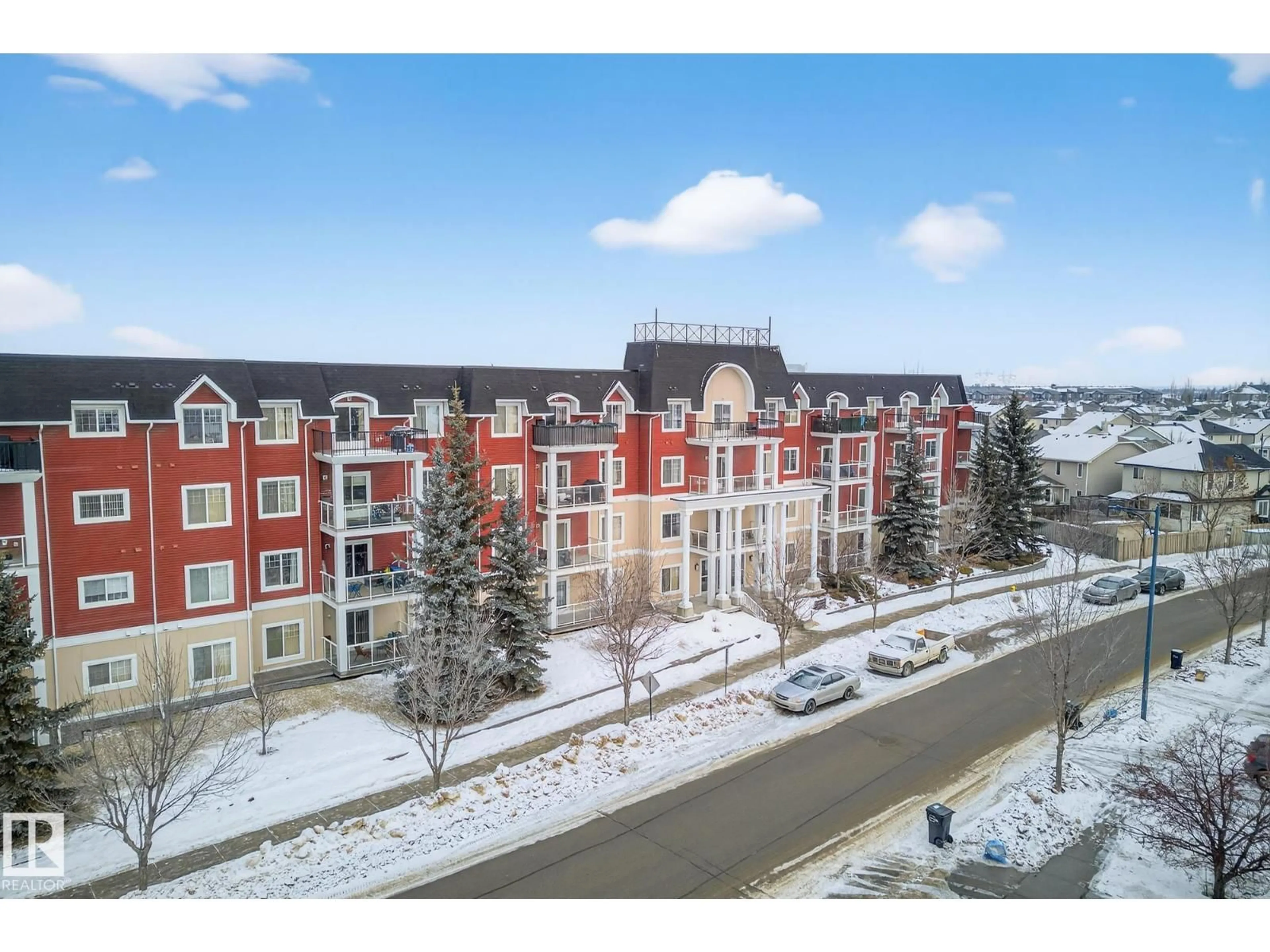 A pic from outside/outdoor area/front of a property/back of a property/a pic from drone, unknown for #111 - 226 MACEWAN ROAD, Edmonton Alberta T6W0C5