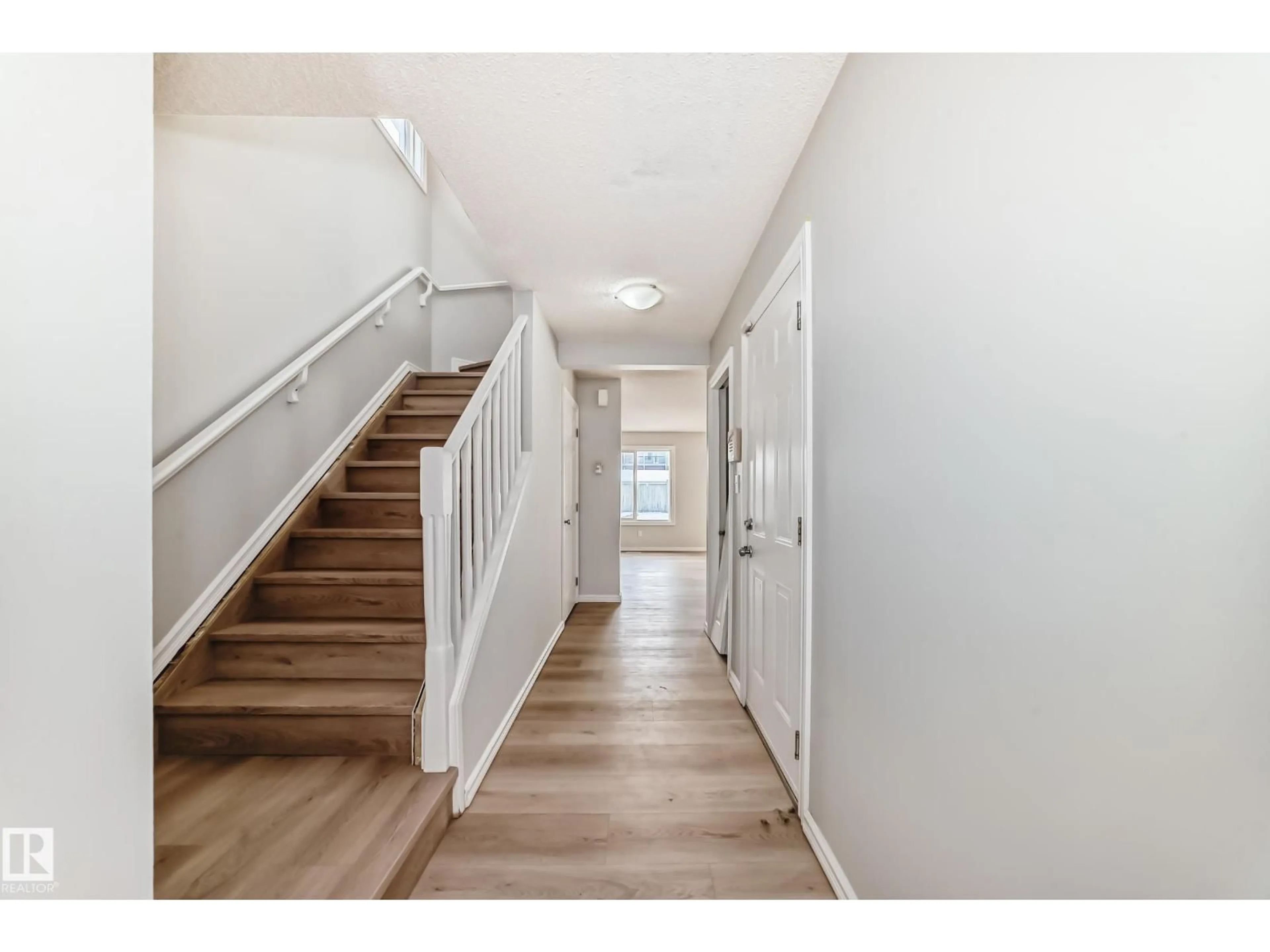 Indoor entryway for 7731 8 AV, Edmonton Alberta T6X0A3