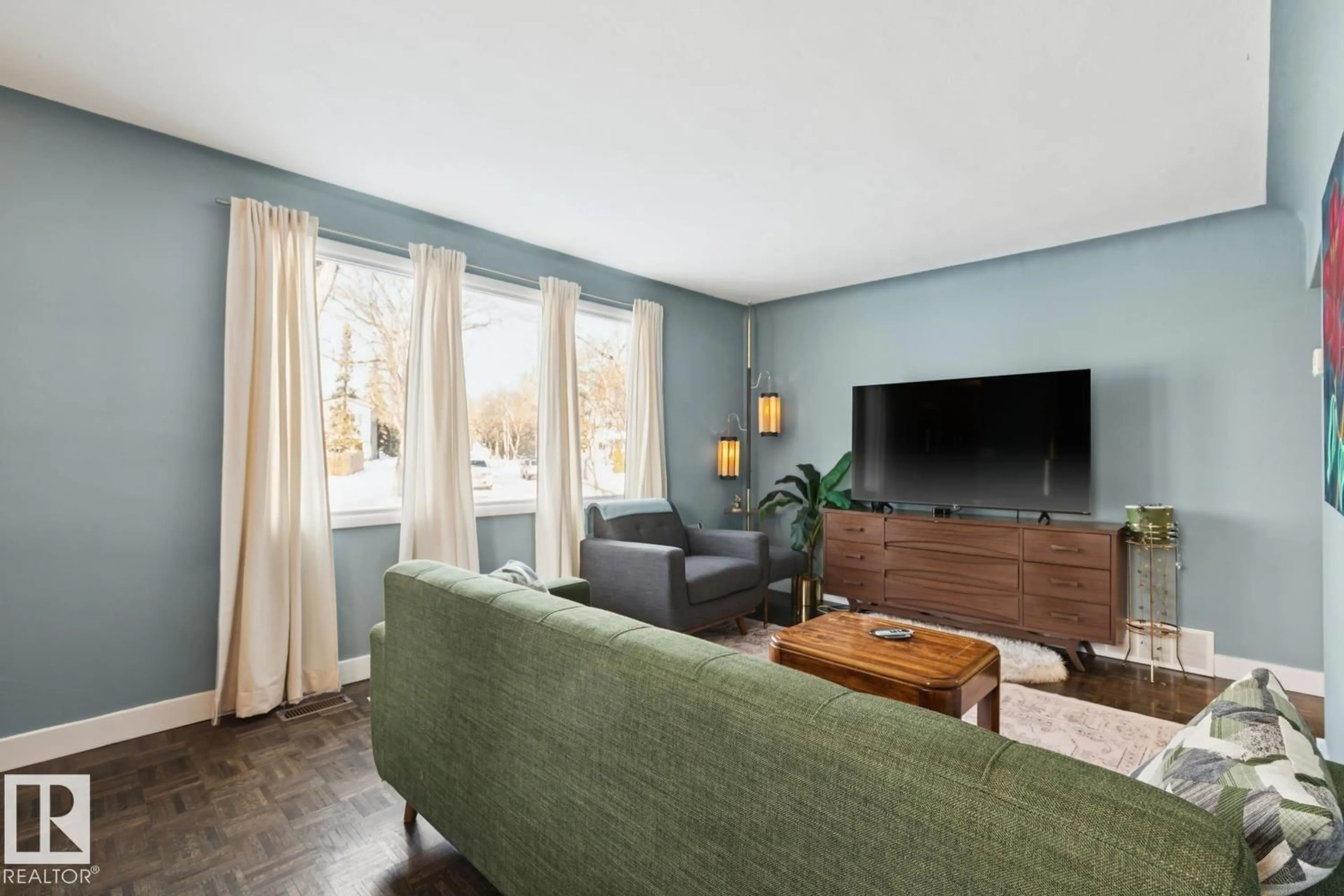 Living room with furniture, unknown for 7601 91 AV, Edmonton Alberta T6C1P7