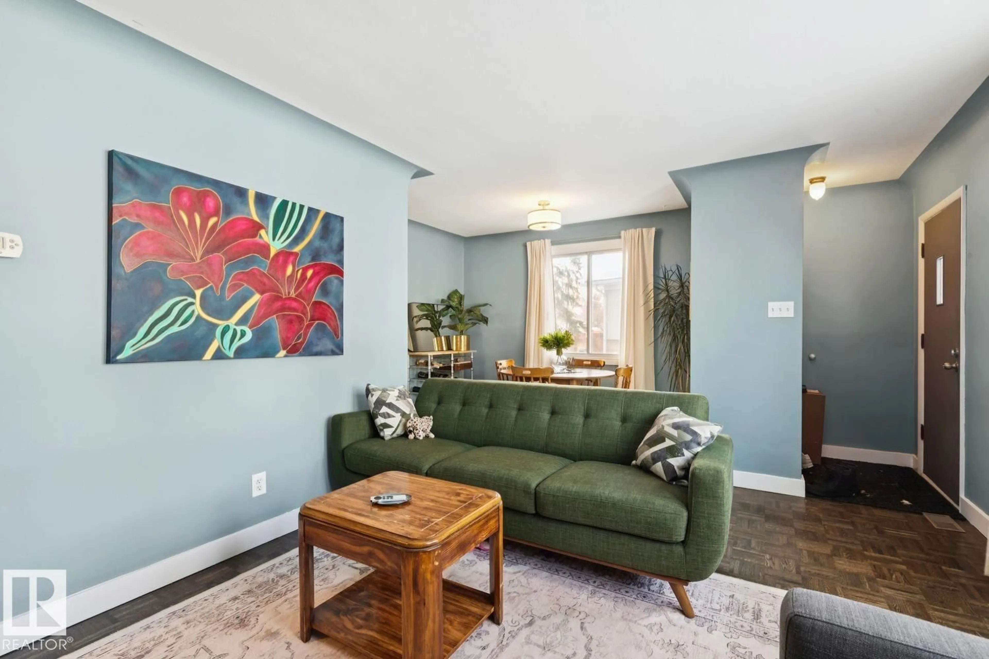 Living room with furniture, unknown for 7601 91 AV, Edmonton Alberta T6C1P7