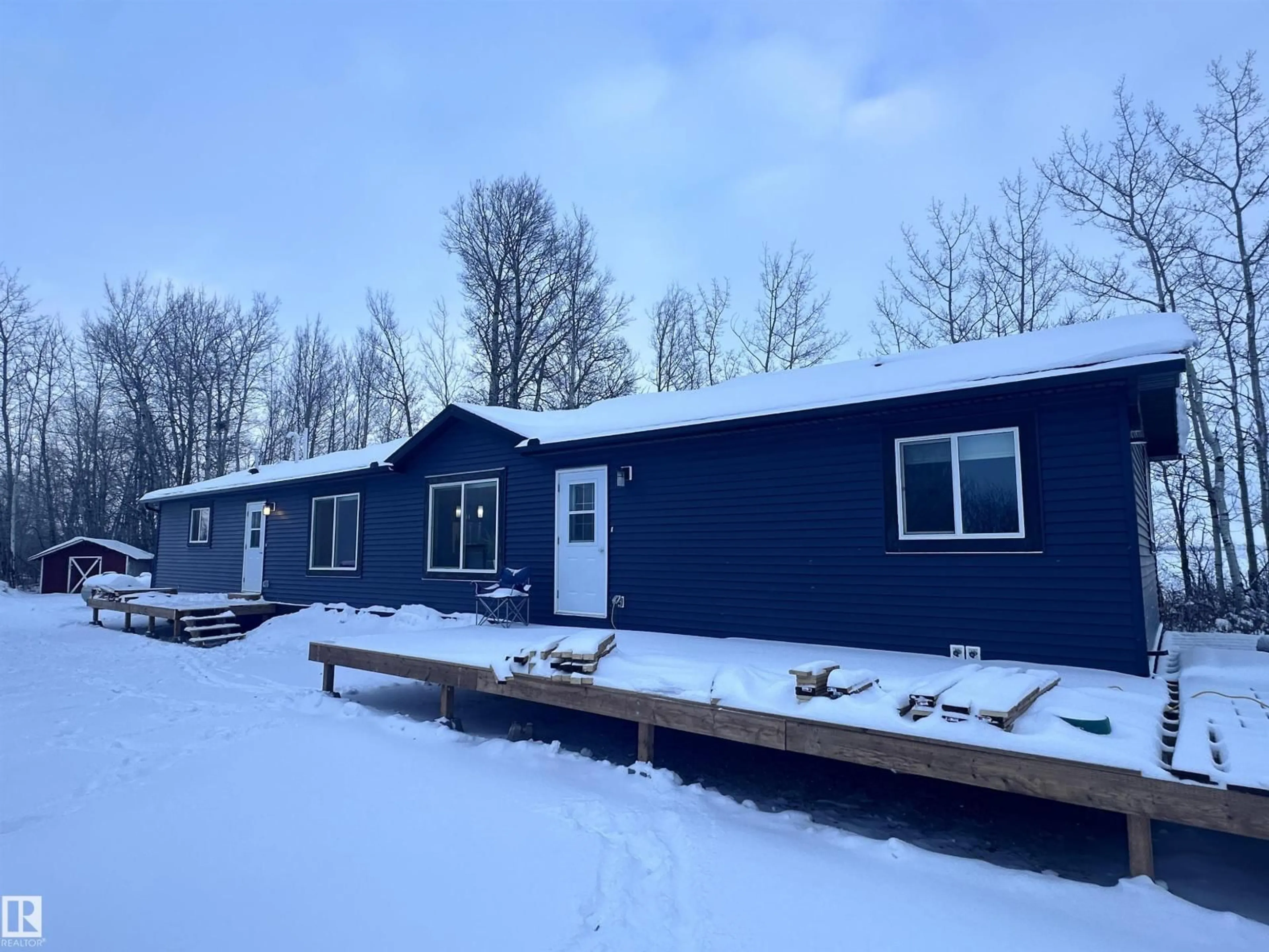 A pic from outside/outdoor area/front of a property/back of a property/a pic from drone, building for 61211 RGE ROAD 265, Rural Westlock County Alberta T7P2P6