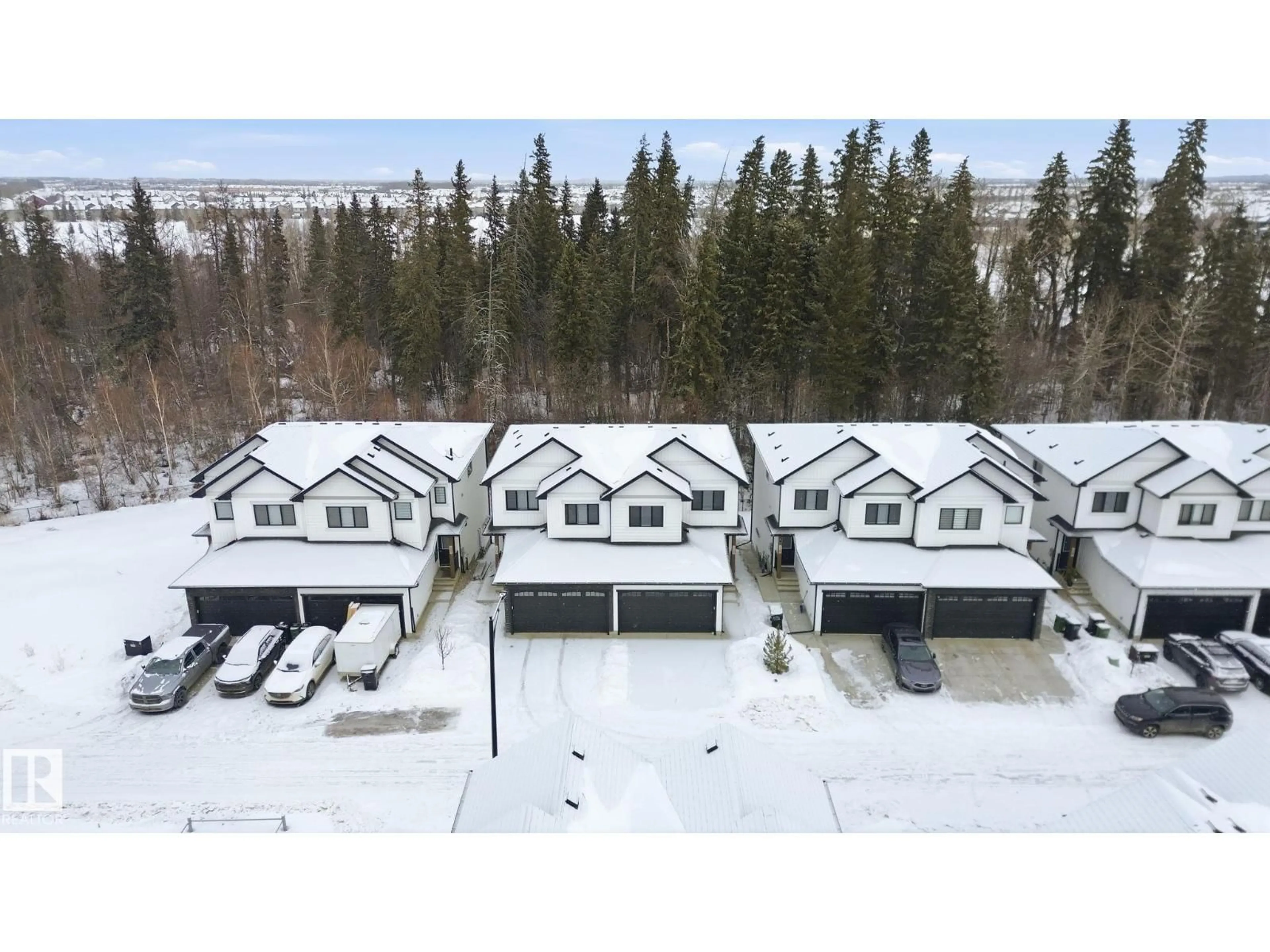 A pic from outside/outdoor area/front of a property/back of a property/a pic from drone, unknown for 19 5122 213A ST NW, Edmonton Alberta T6M1M6