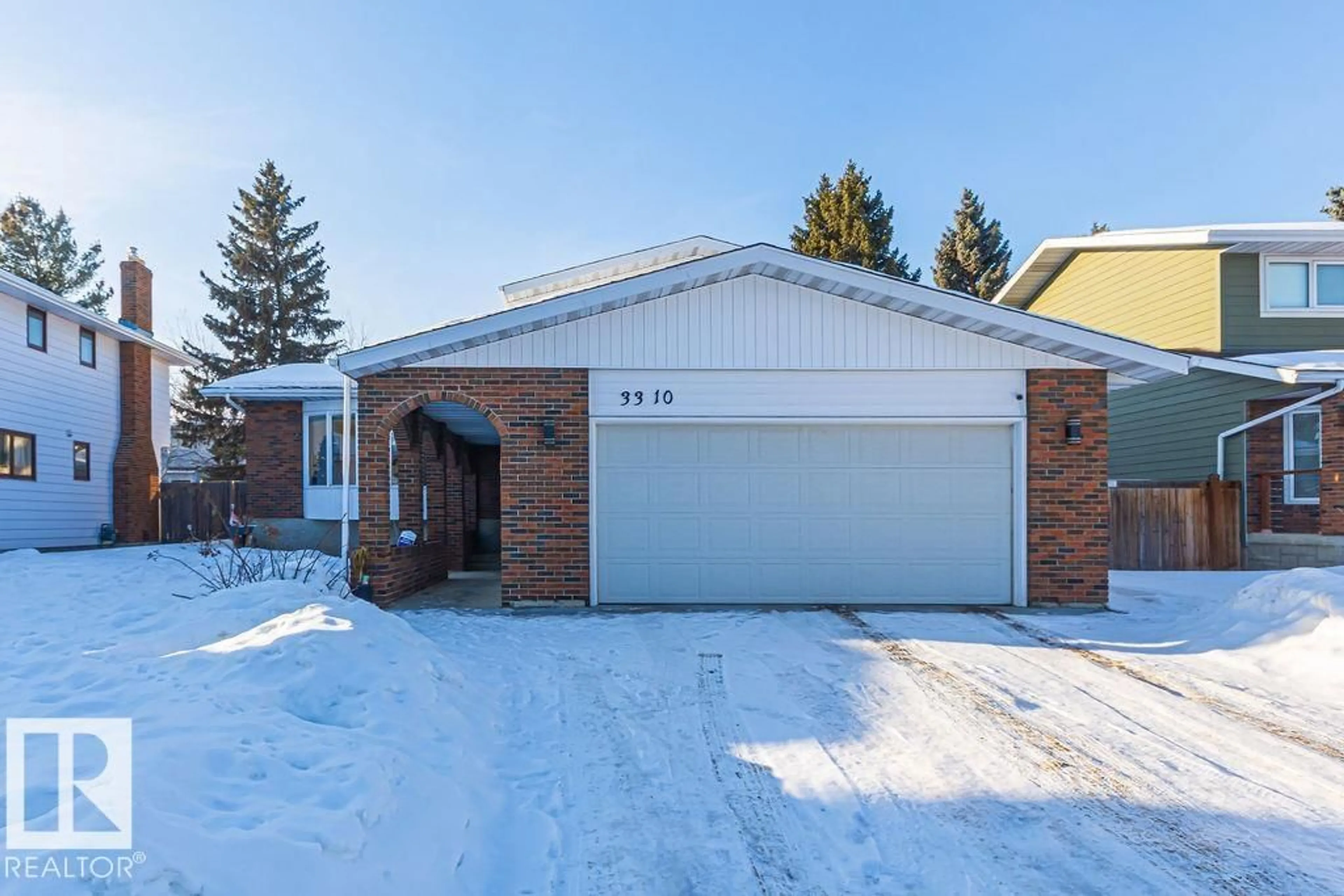 Home with brick exterior material, street for NW - 3310 113A ST, Edmonton Alberta T6J3V8