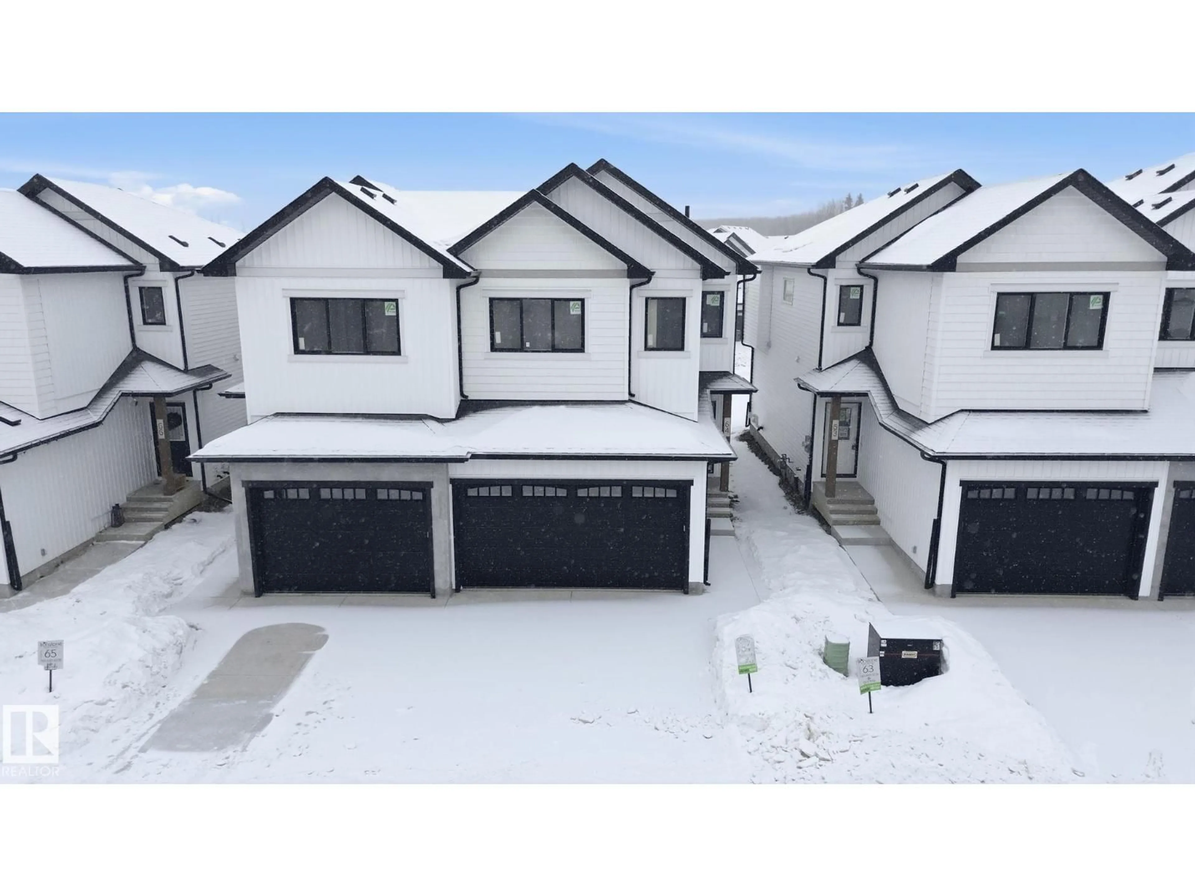 A pic from outside/outdoor area/front of a property/back of a property/a pic from drone, street for 64 5122 213A ST NW, Edmonton Alberta T6M1M6