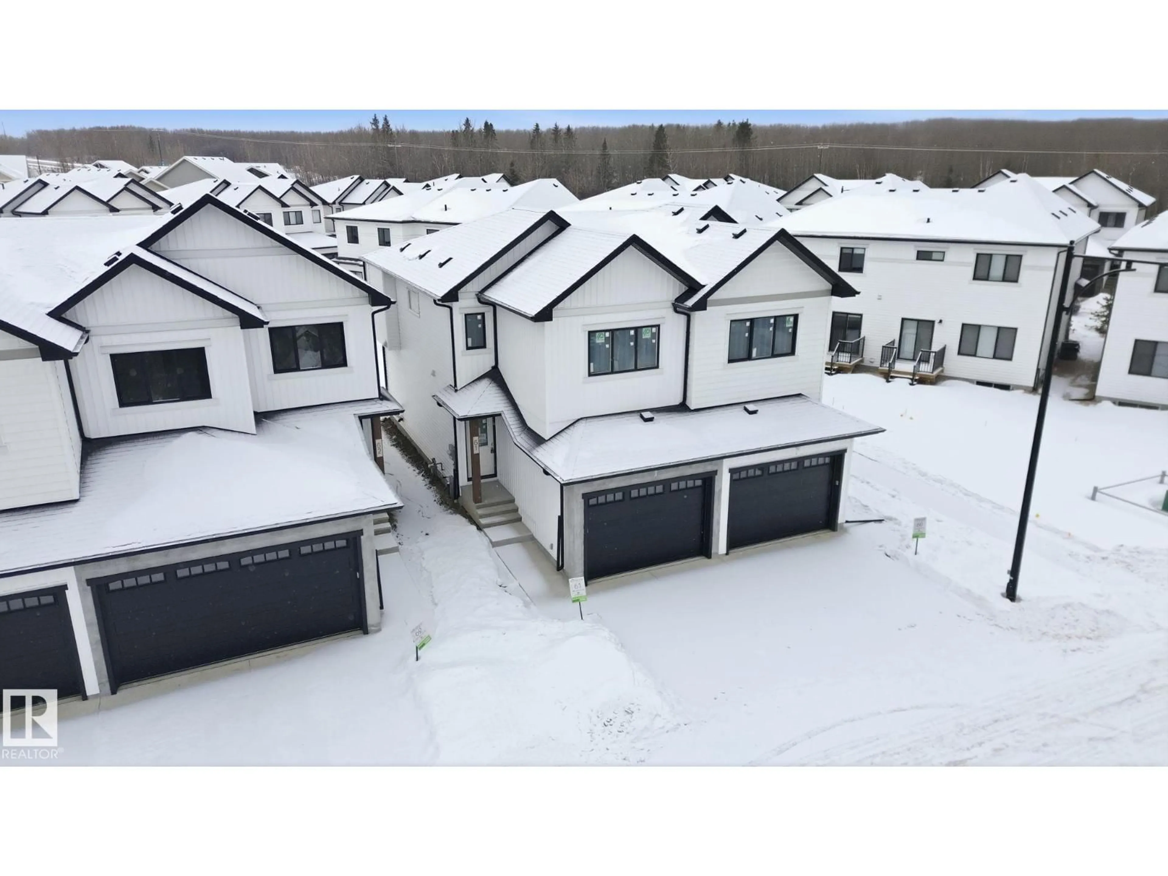 A pic from outside/outdoor area/front of a property/back of a property/a pic from drone, unknown for #61 - 5122 213A ST, Edmonton Alberta T6M1M6