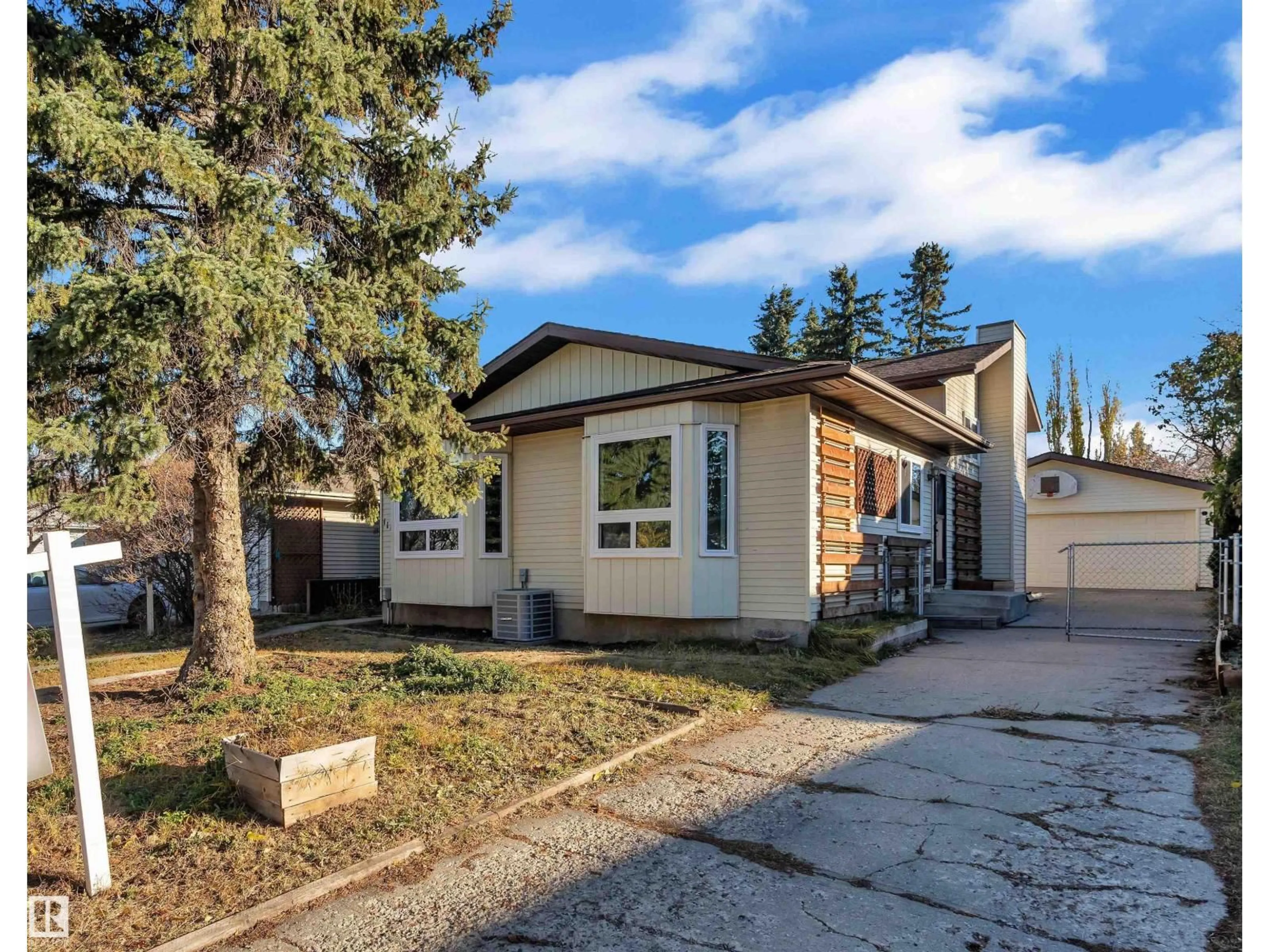 Home with vinyl exterior material, street for 1111 49A ST, Edmonton Alberta T6L5X5