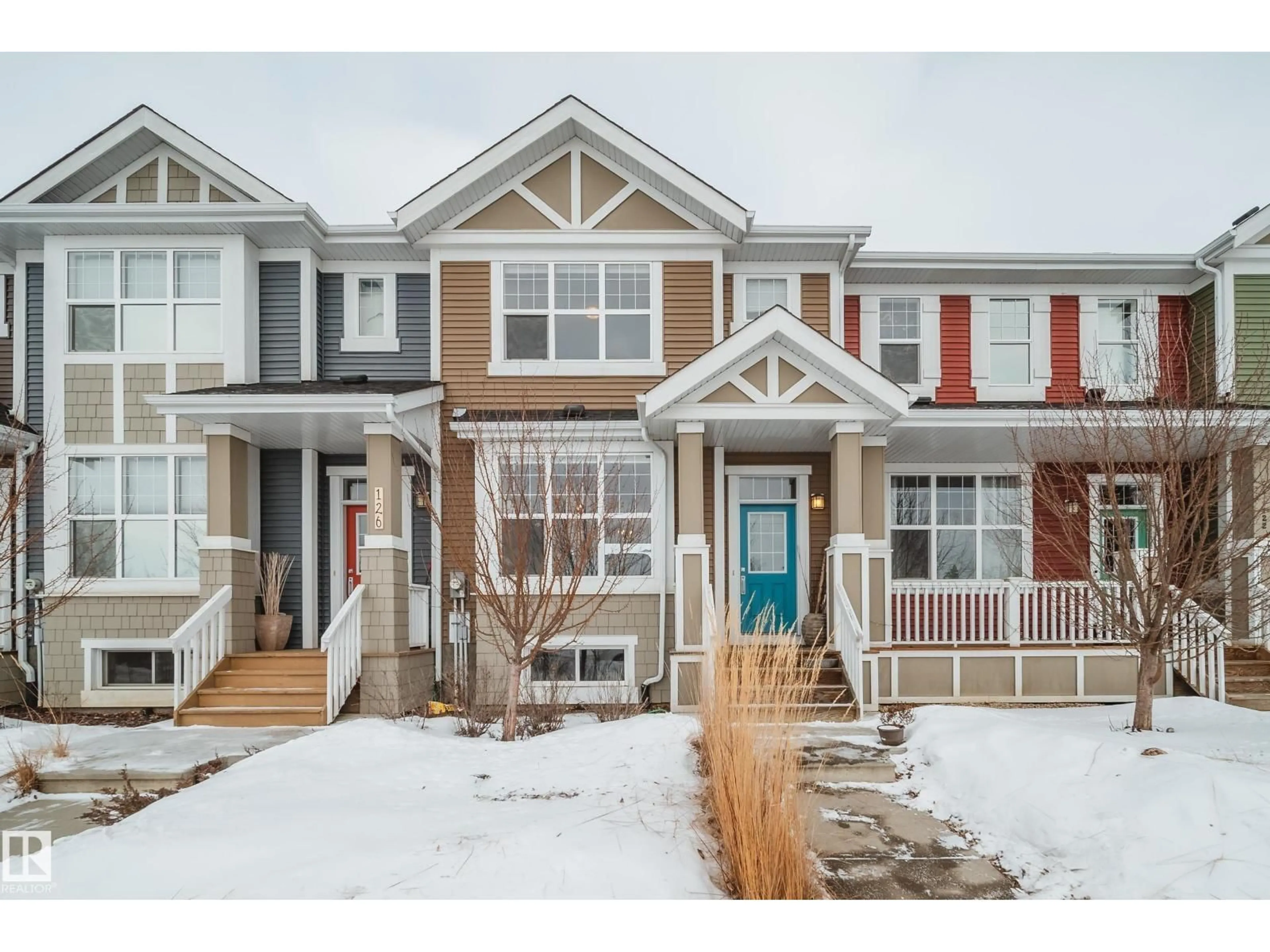 Home with vinyl exterior material, street for 124 SOUTHFORK RD, Leduc Alberta T9E1E2