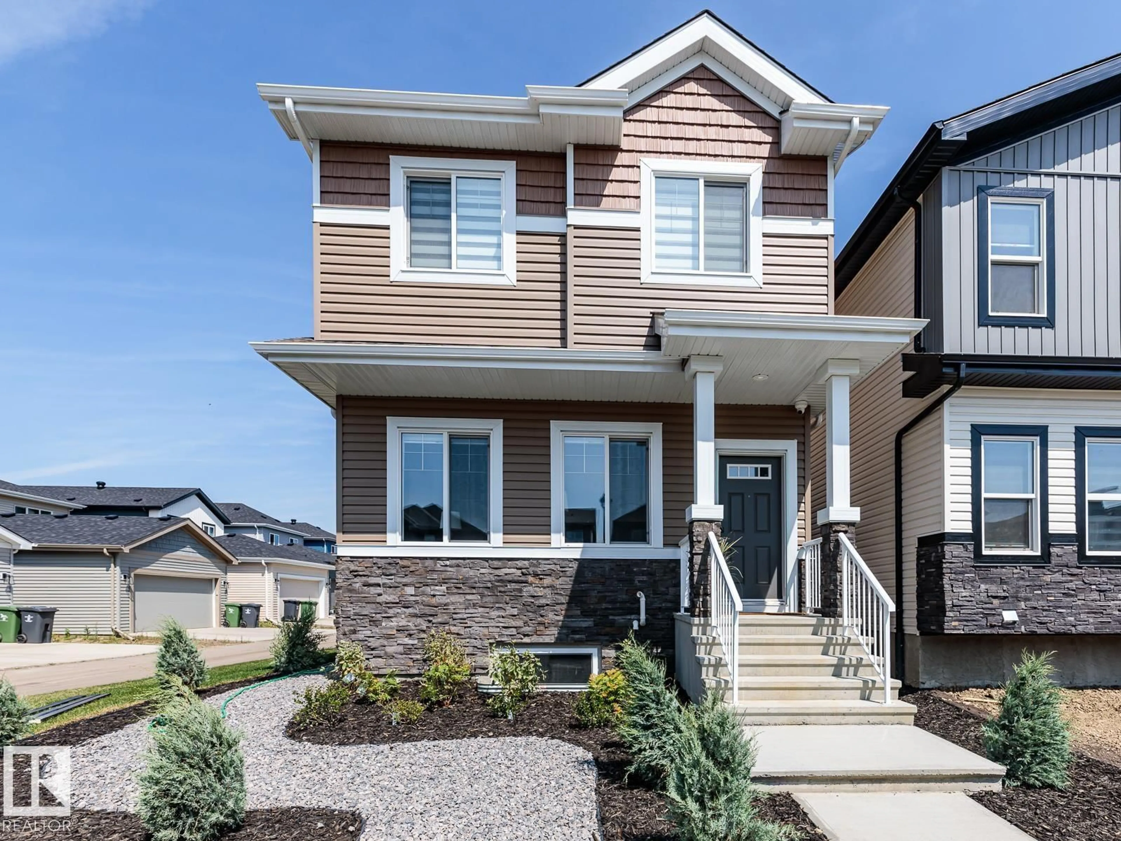 Home with vinyl exterior material, street for 3724 42 AV, Beaumont Alberta T4X3B3