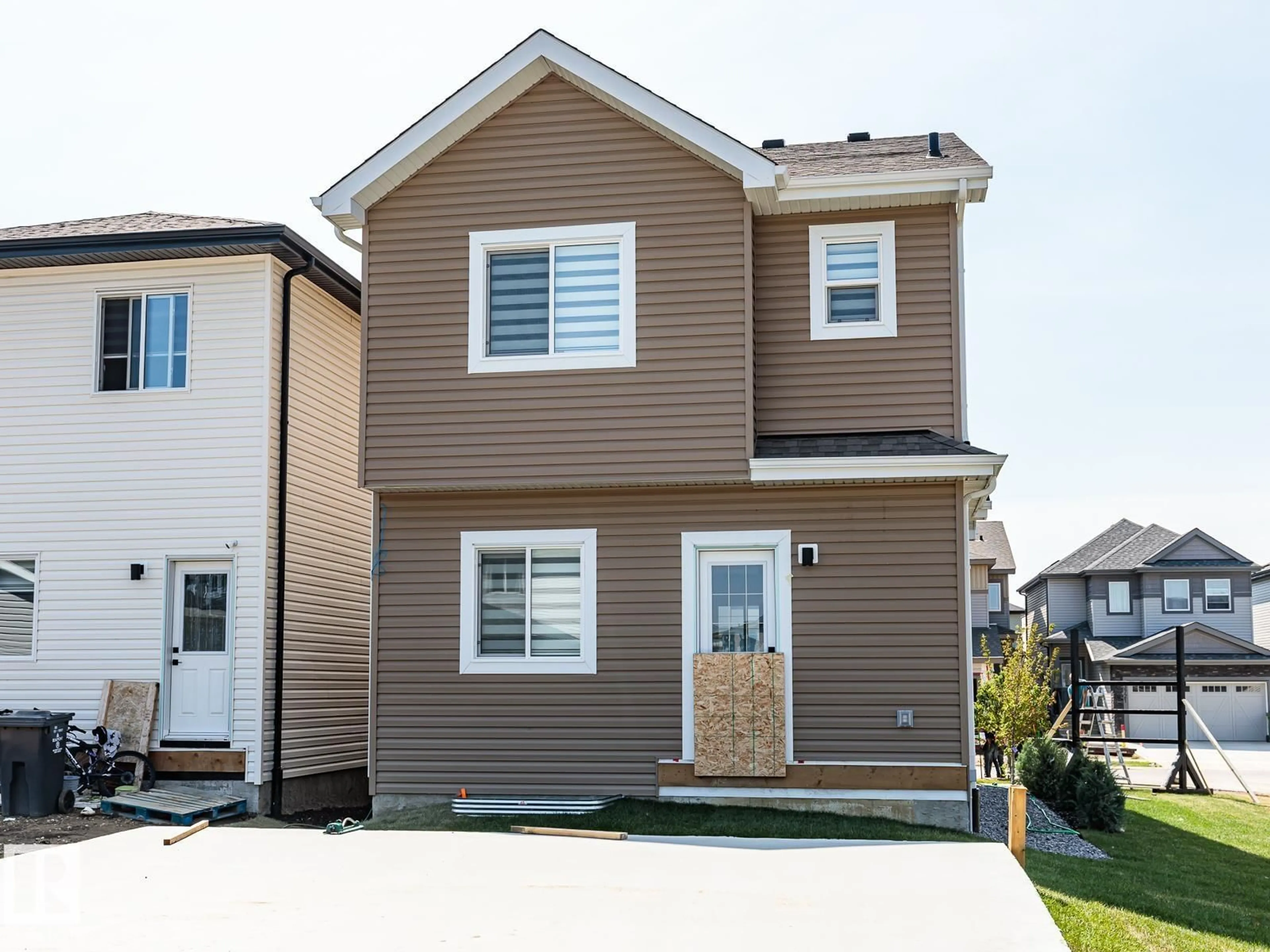 Home with vinyl exterior material, street for 3724 42 AV, Beaumont Alberta T4X3B3