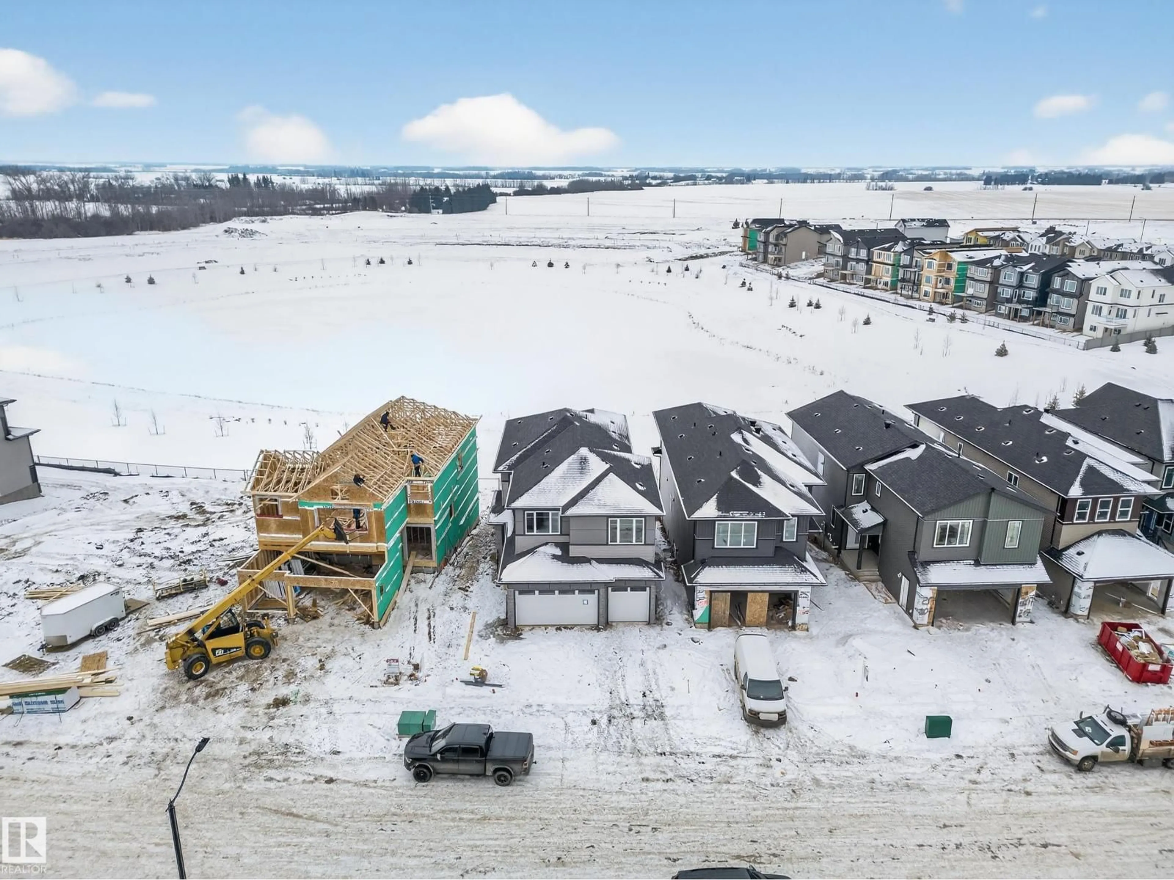 A pic from outside/outdoor area/front of a property/back of a property/a pic from drone, unknown for 211 CRYSTAL CREEK DRIVE, Leduc Alberta T9E0X6