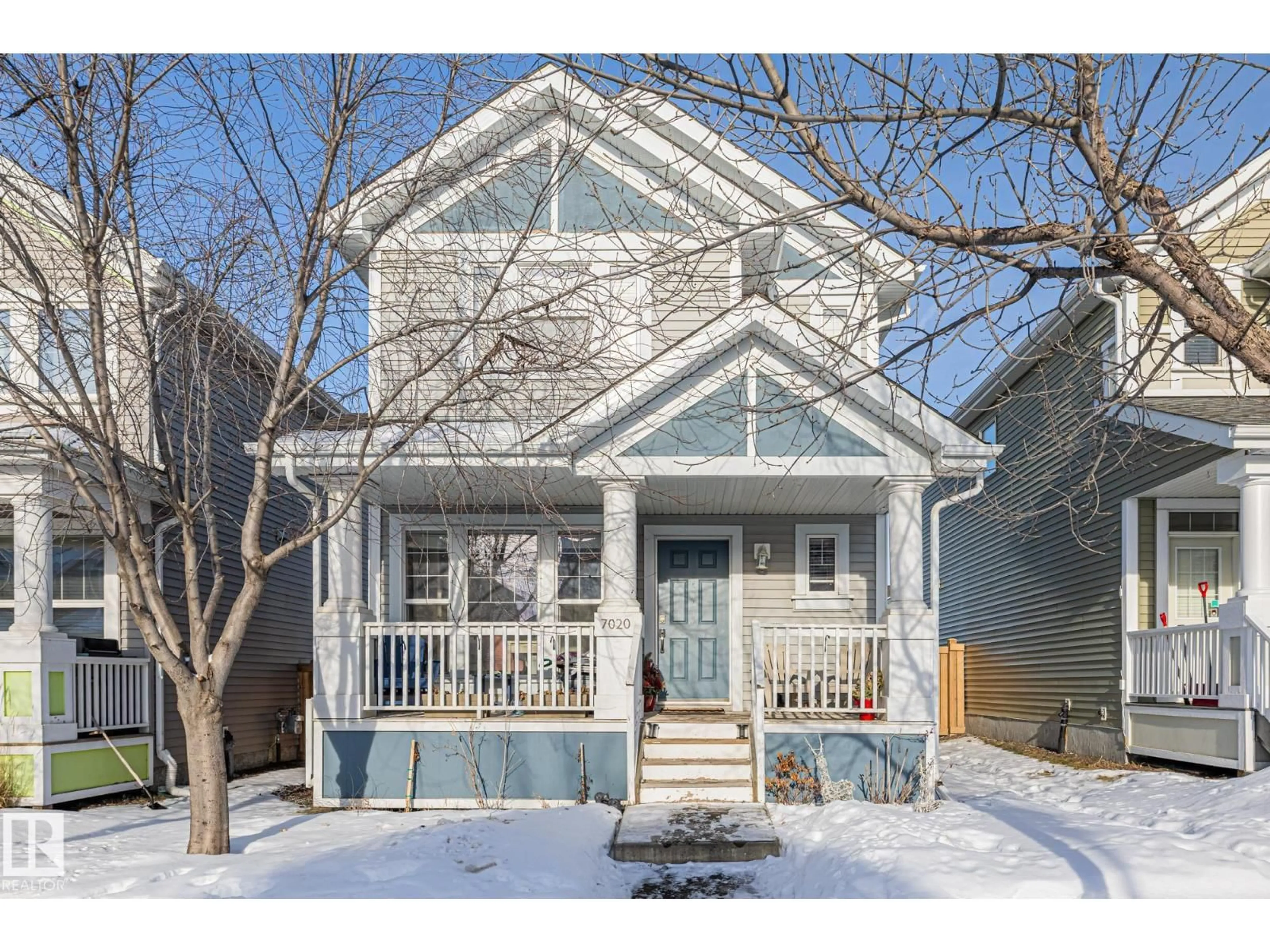 Home with vinyl exterior material, street for SW - 7020 22 AV, Edmonton Alberta T6X0T8