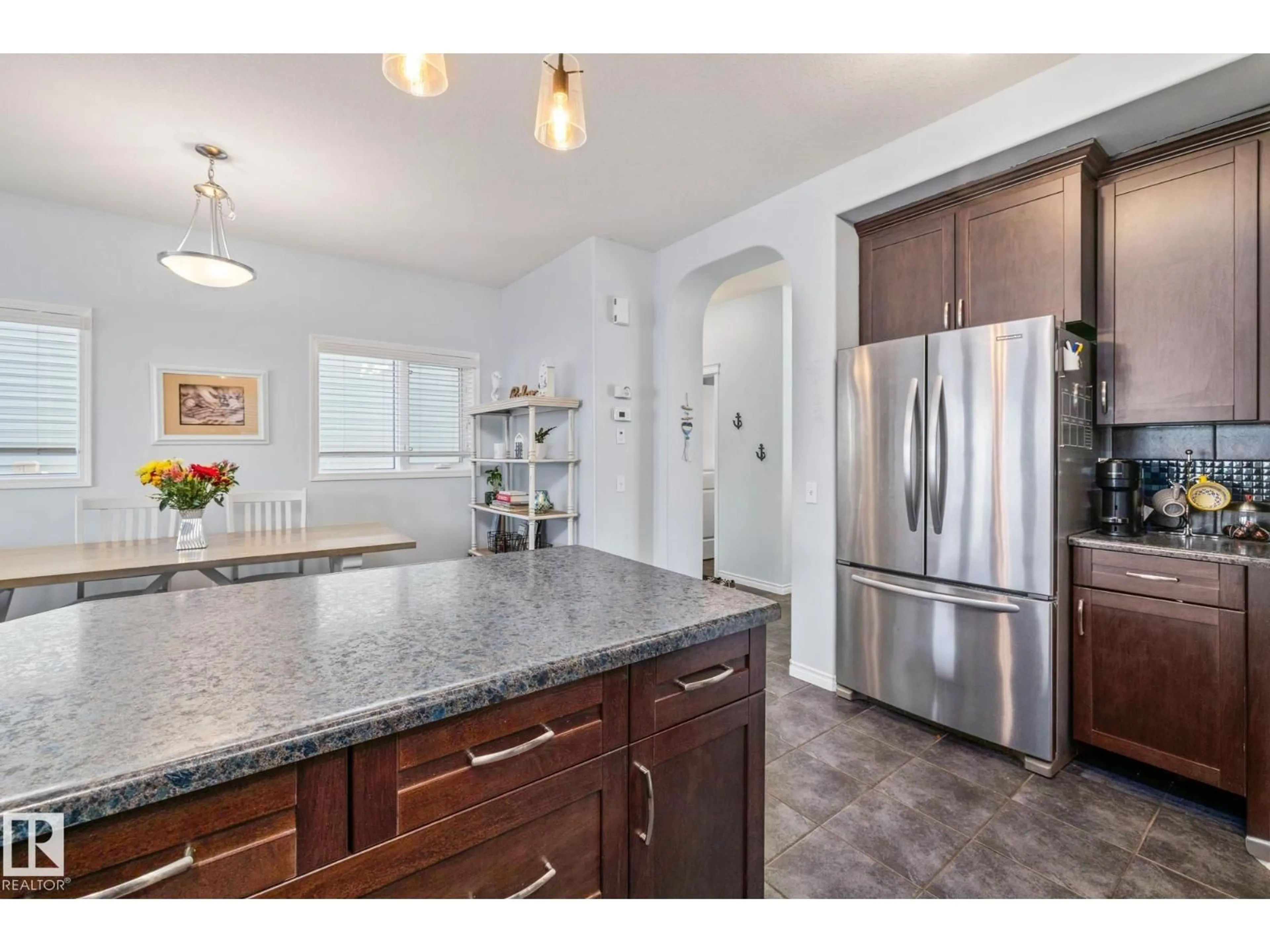 Open concept kitchen, ceramic/tile floor for SW - 7020 22 AV, Edmonton Alberta T6X0T8