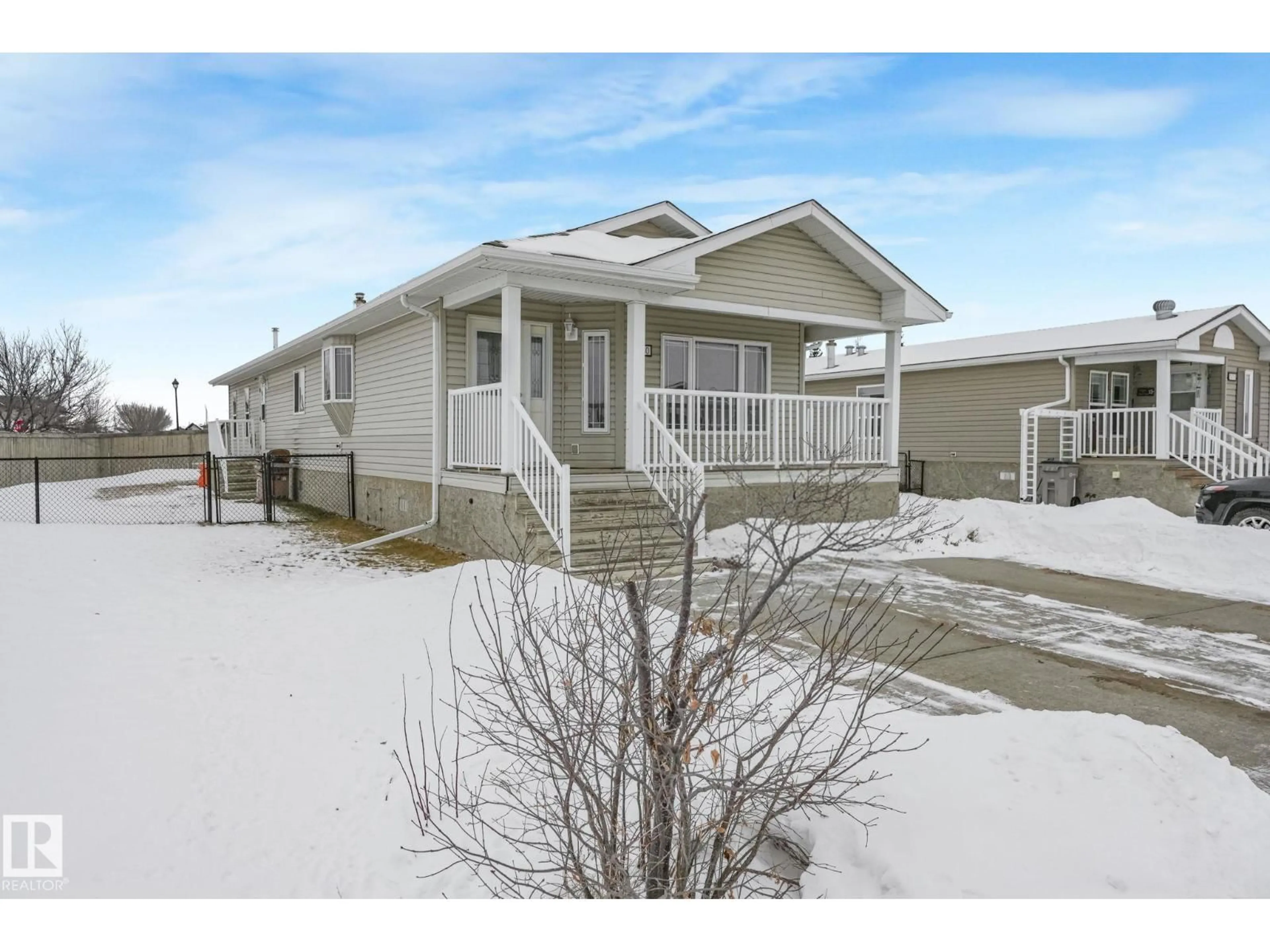 Home with vinyl exterior material, street for 1080 ASPEN DR, Leduc Alberta T9E8R1