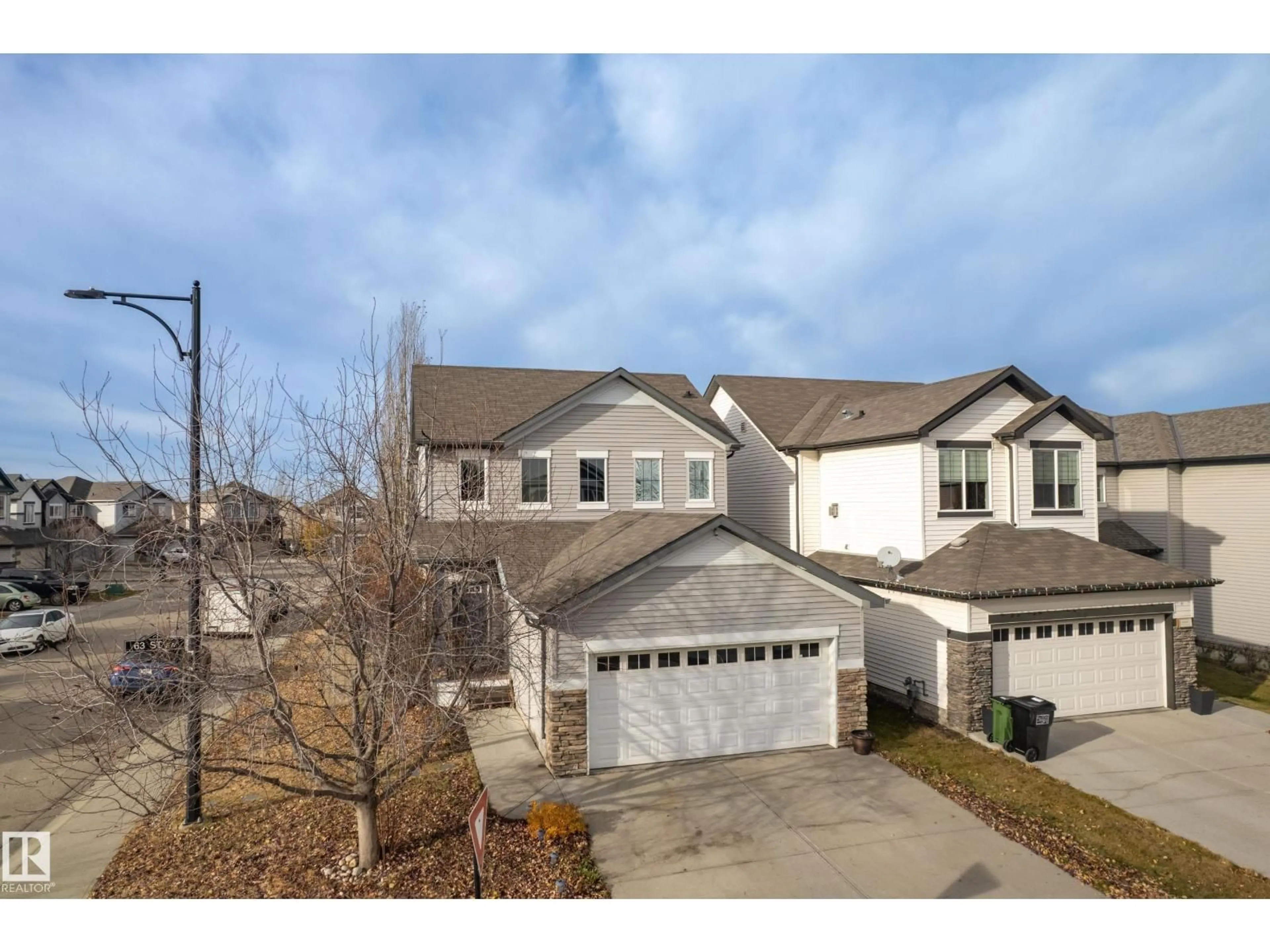 A pic from outside/outdoor area/front of a property/back of a property/a pic from drone, street for SW - 1756 63 ST, Edmonton Alberta T6X0S1