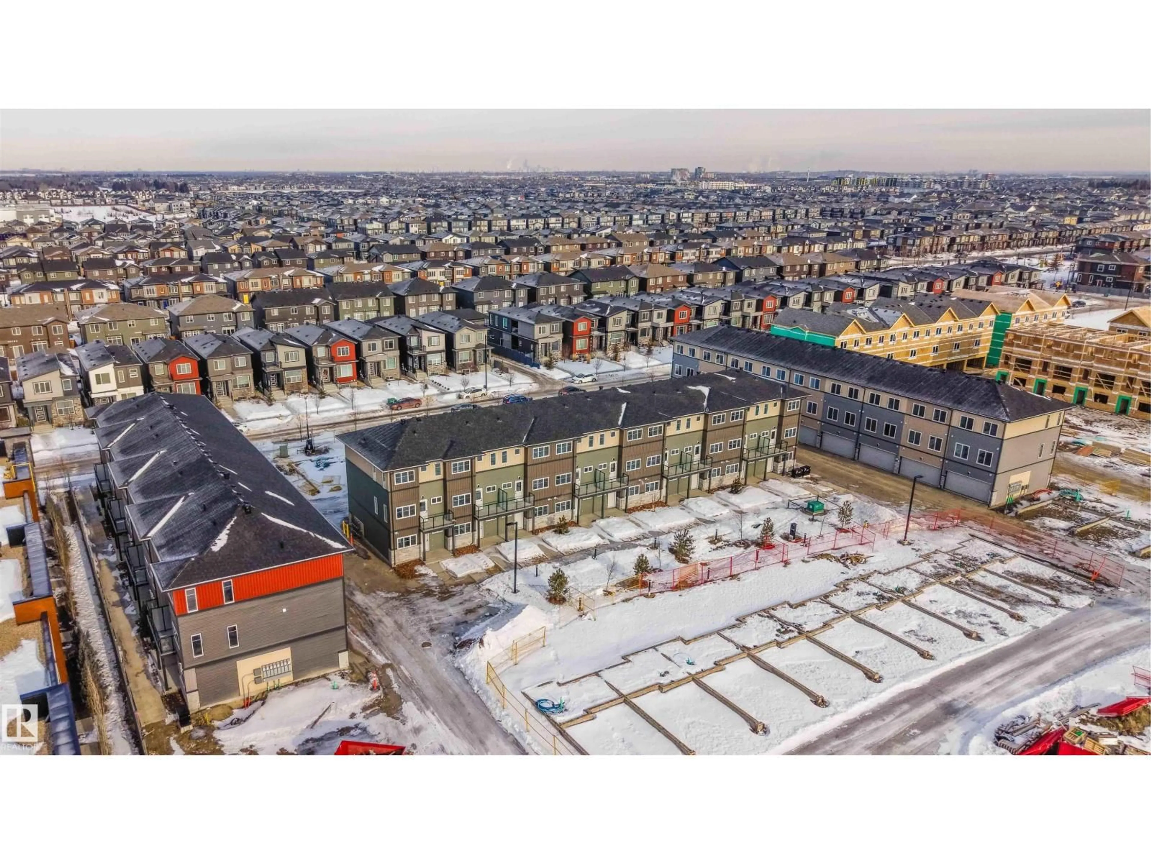 A pic from outside/outdoor area/front of a property/back of a property/a pic from drone, city buildings view from balcony for 64 18120 28 AV SW, Edmonton Alberta T6W4V2