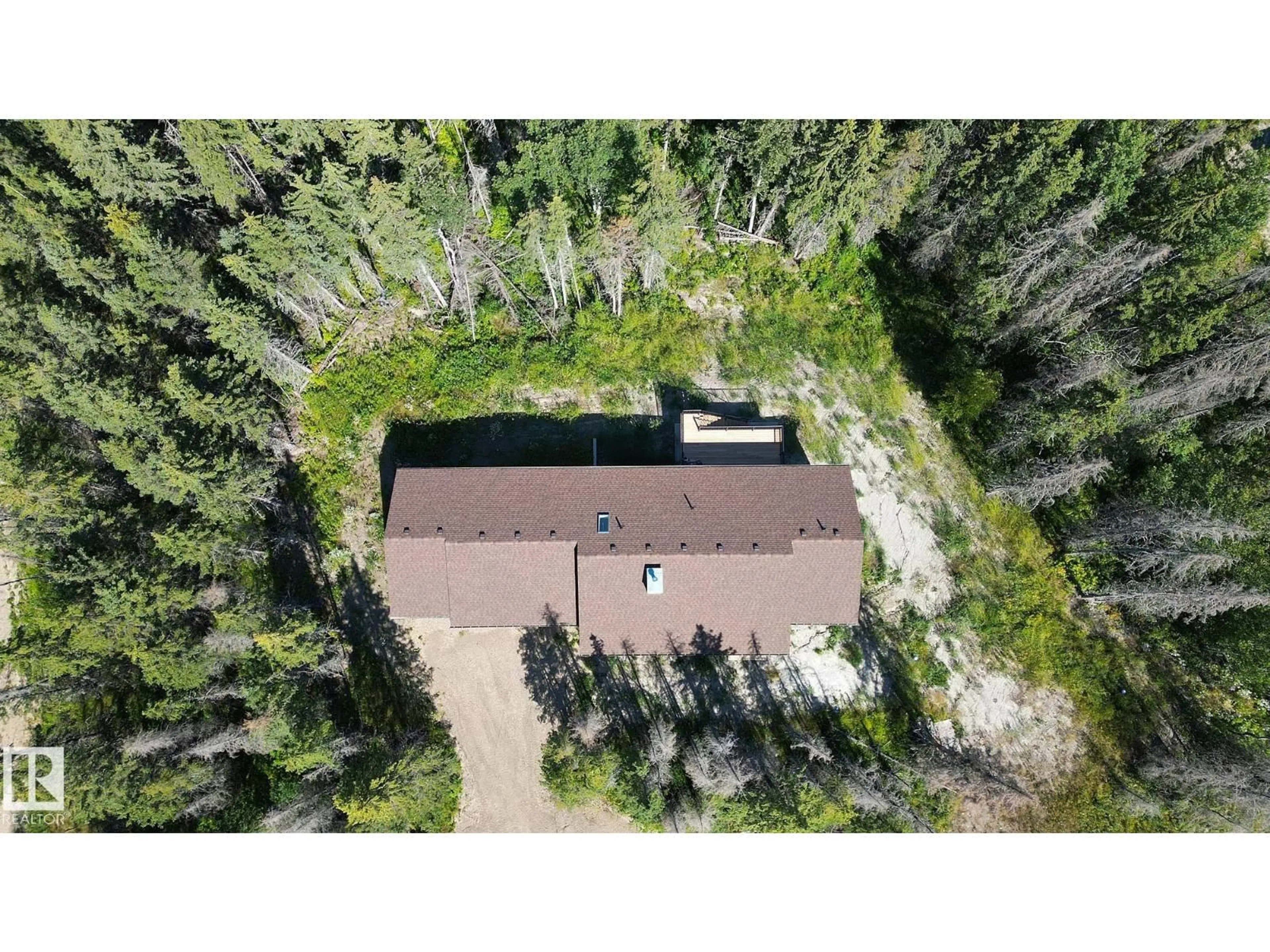 A pic from outside/outdoor area/front of a property/back of a property/a pic from drone, forest/trees view for 55504 - 311 RR 13, Rural Lac Ste. Anne County Alberta T0E1V0