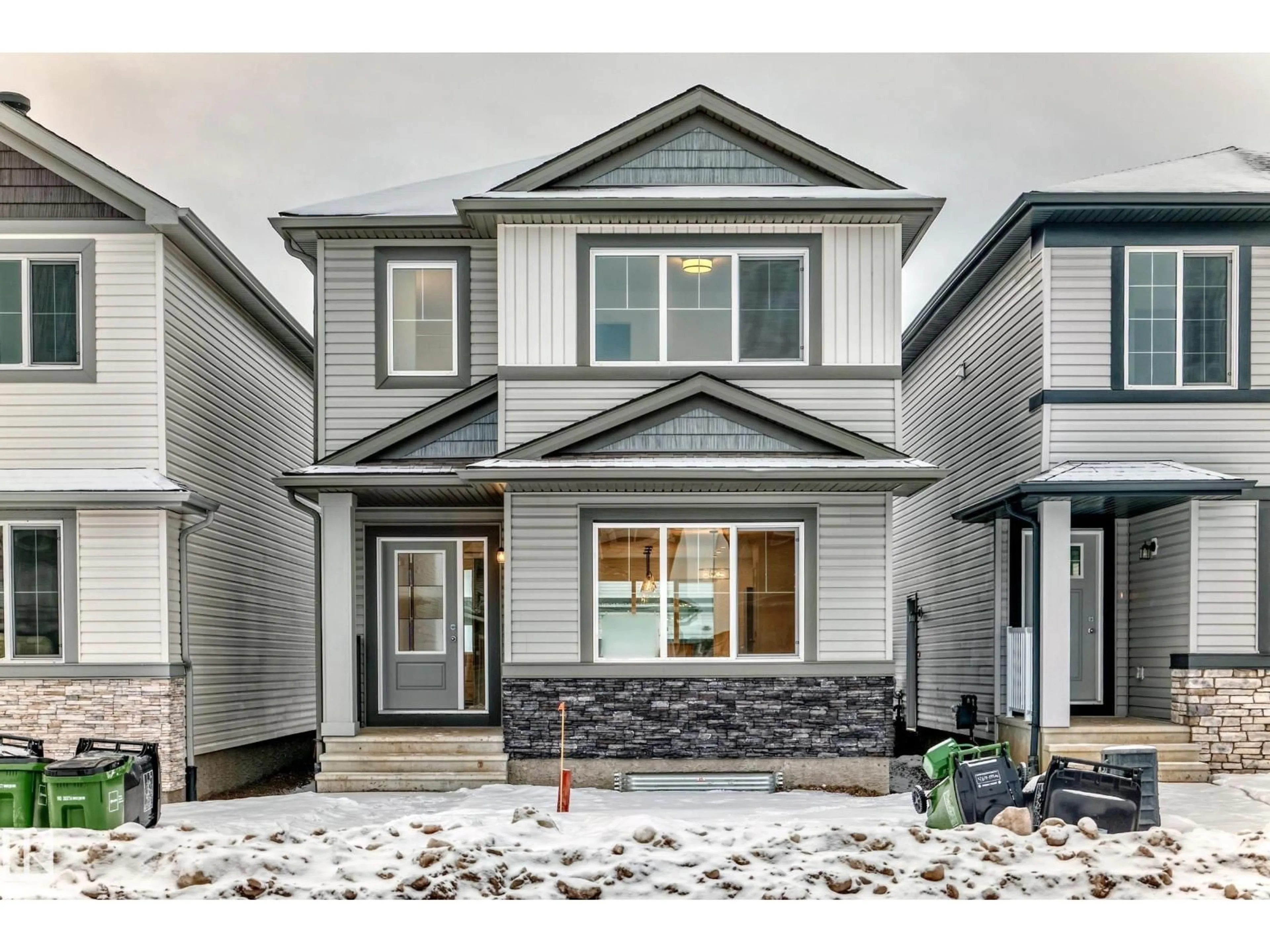 Home with vinyl exterior material, street for 4615 177 AVE, Edmonton Alberta T5Y4B7