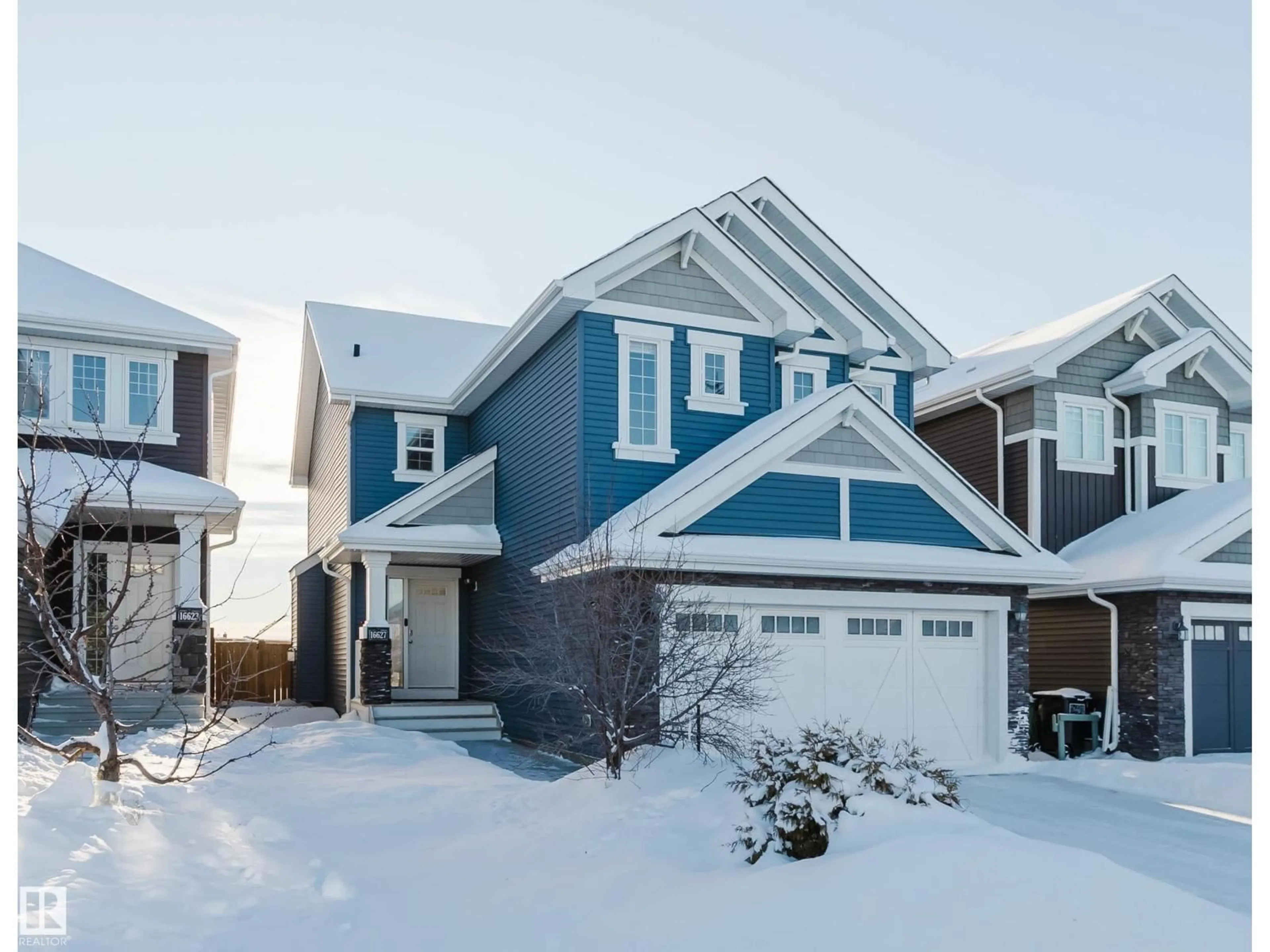 Home with vinyl exterior material, street for SW - 16627 18 AV, Edmonton Alberta T6W3C5