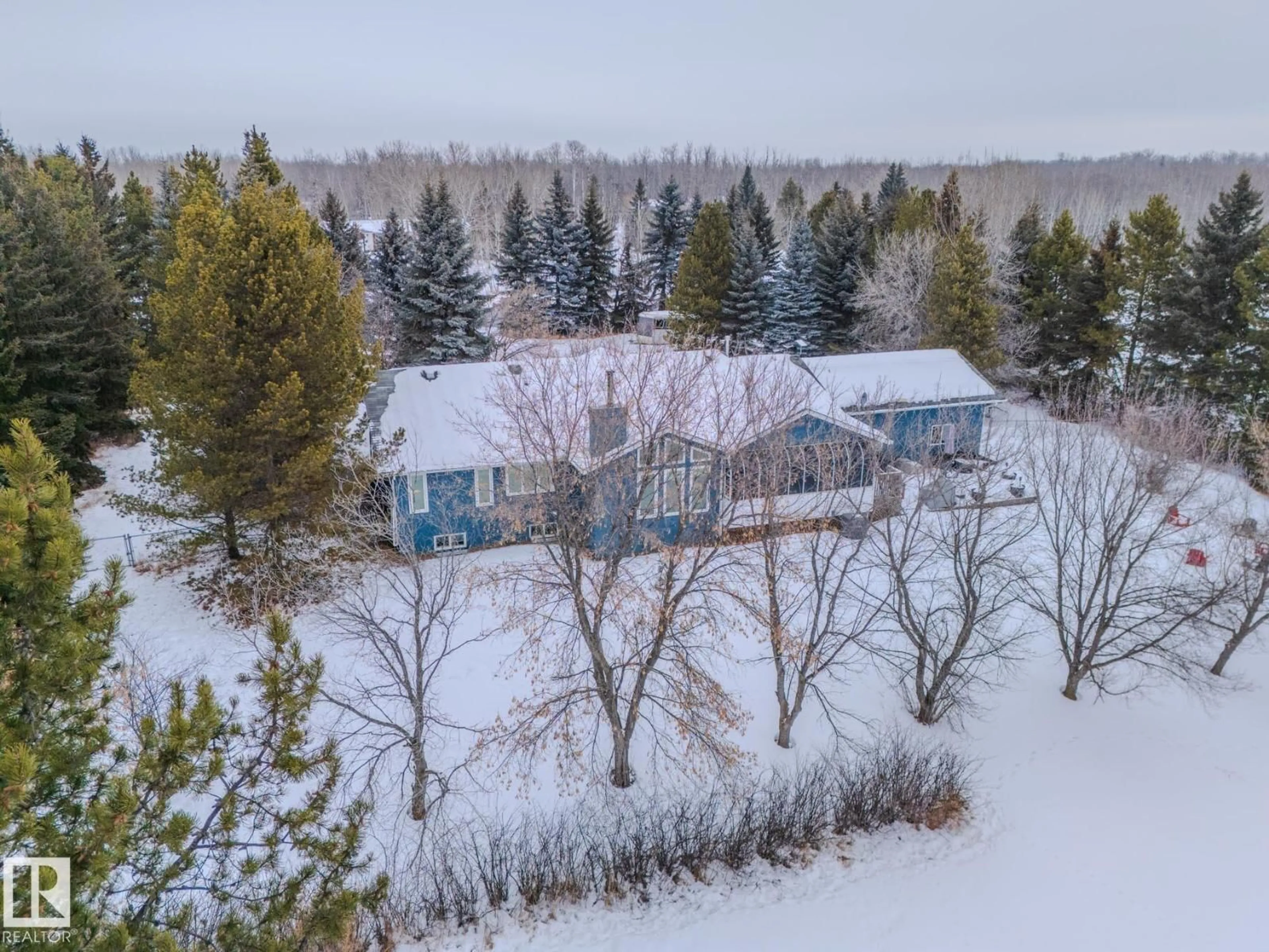 A pic from outside/outdoor area/front of a property/back of a property/a pic from drone, forest/trees view for 51350 - 230 RGE RD 224, Rural Strathcona County Alberta T8C1H3
