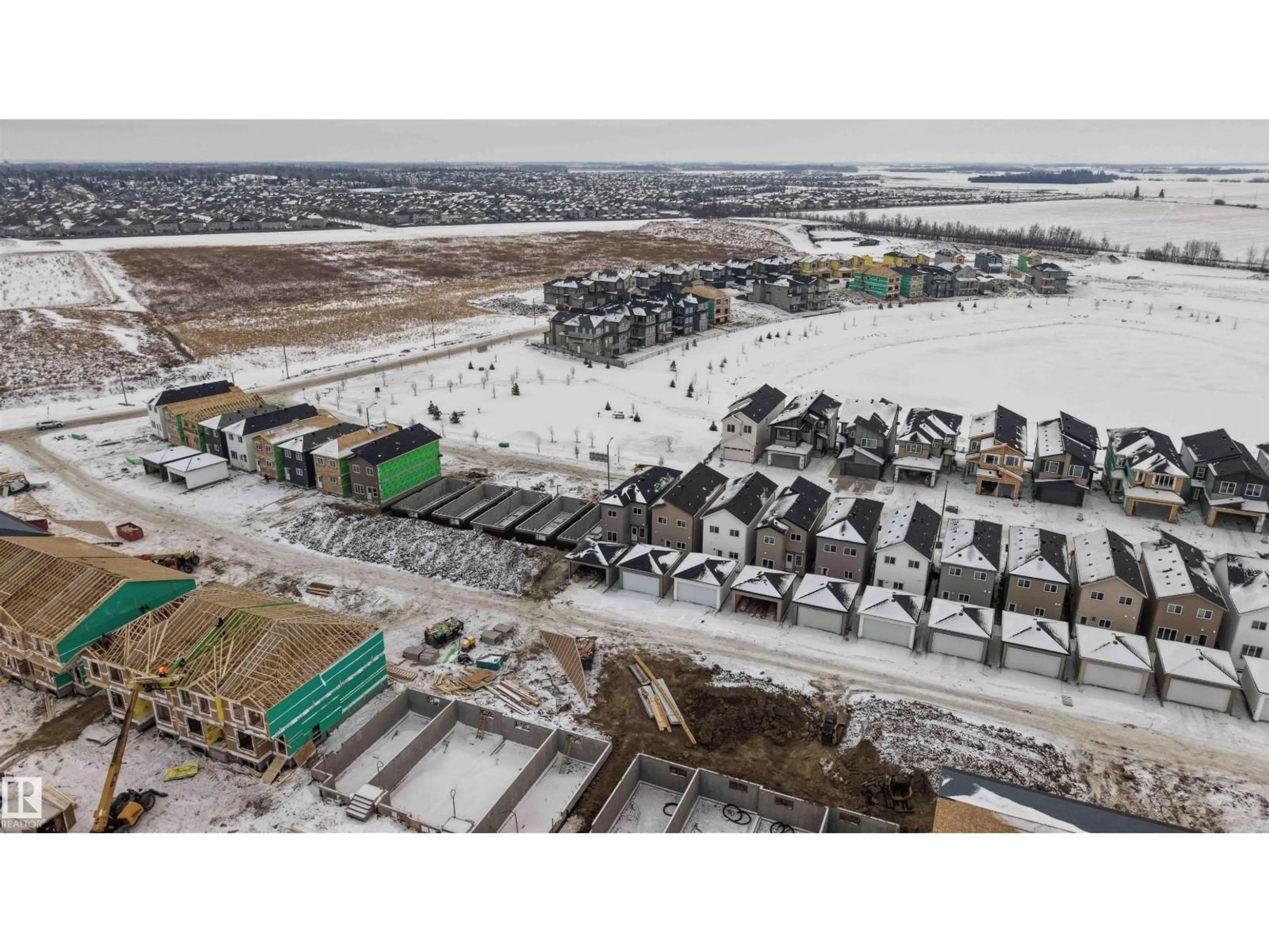 A pic from outside/outdoor area/front of a property/back of a property/a pic from drone, building for 430 CRYSTAL CREEK LI, Leduc Alberta T9E0X5