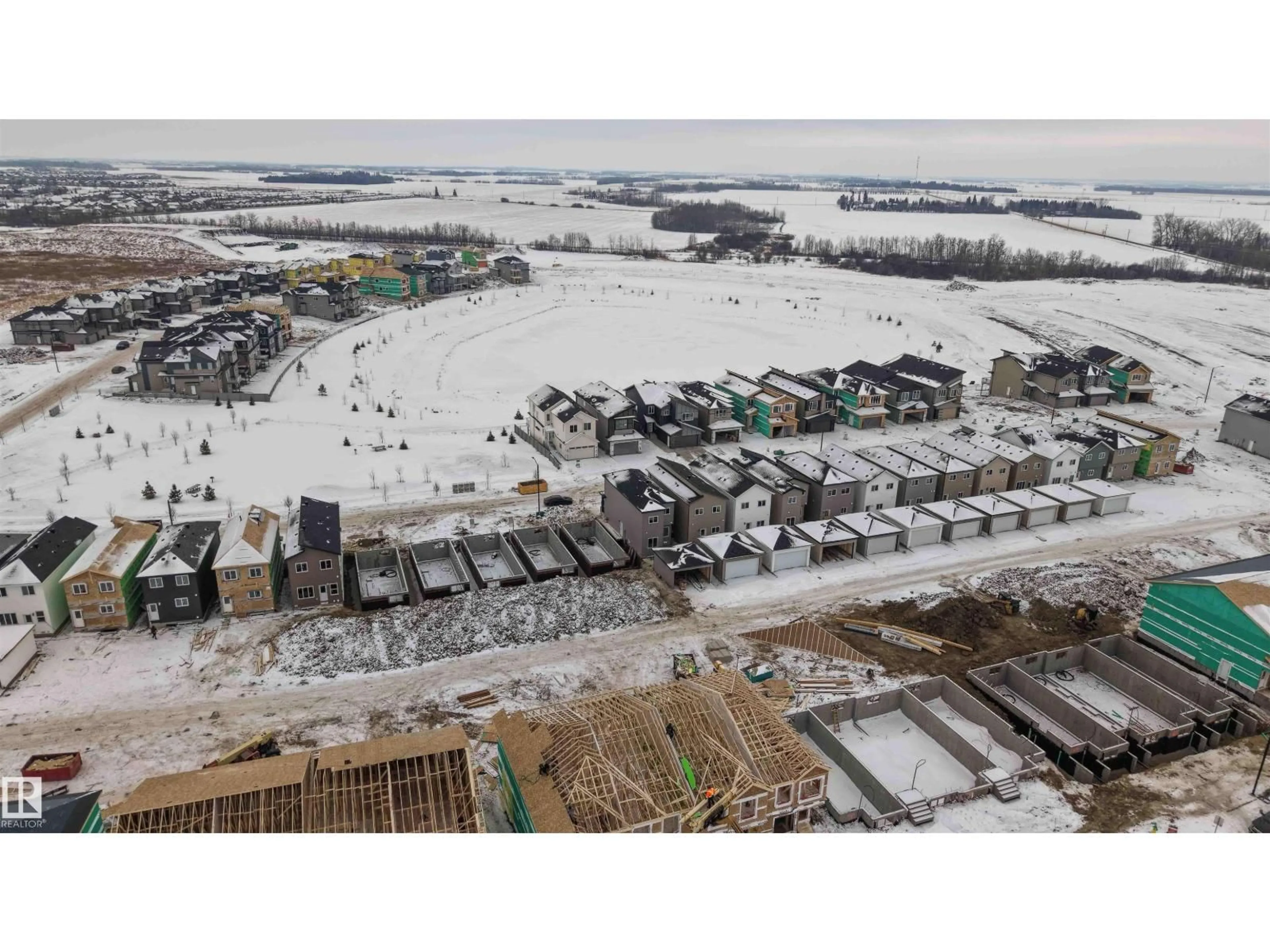 A pic from outside/outdoor area/front of a property/back of a property/a pic from drone, unknown for 430 CRYSTAL CREEK LI, Leduc Alberta T9E0X5
