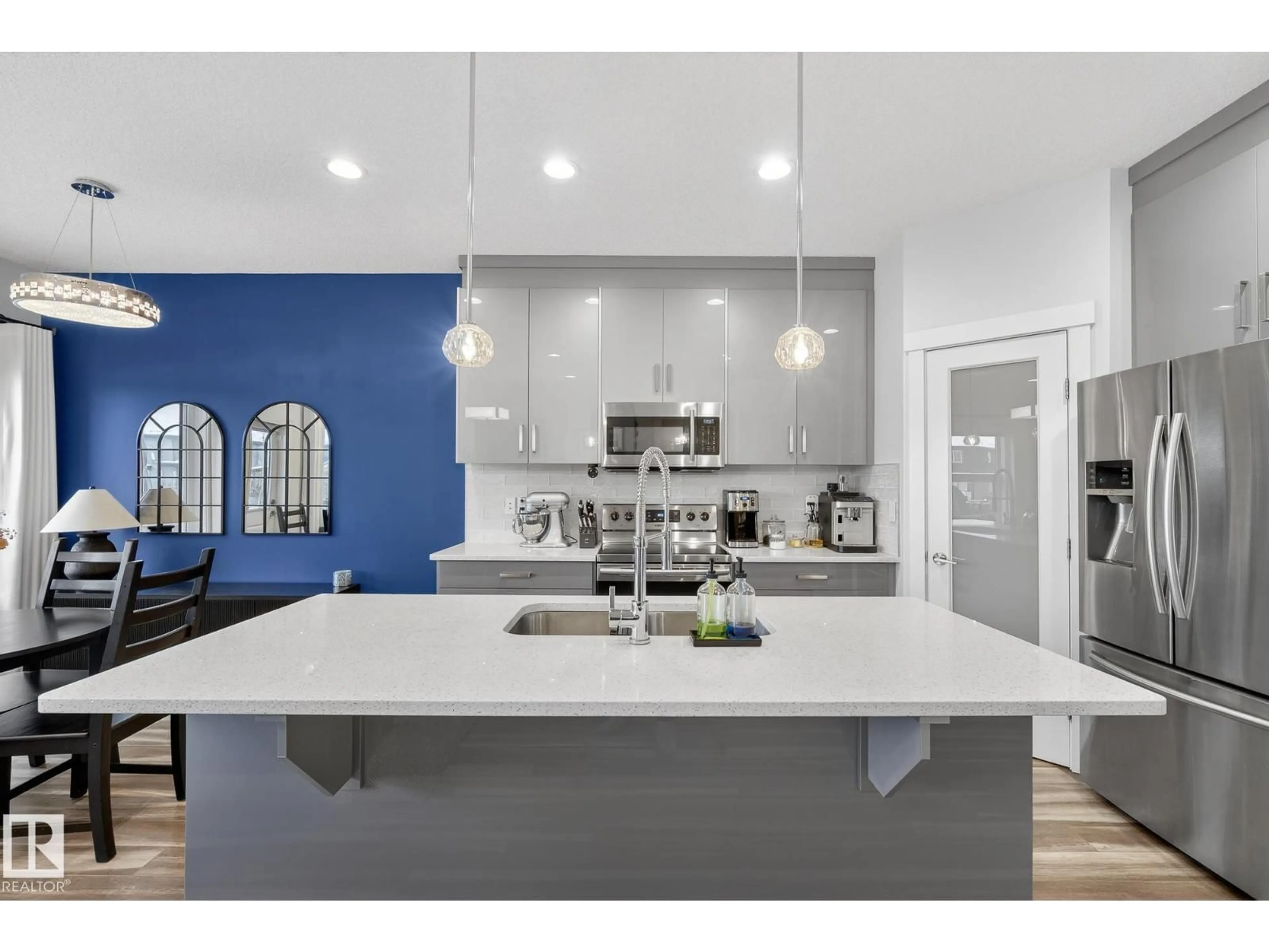 Open concept kitchen, ceramic/tile floor for 17727 13 AV, Edmonton Alberta T6W2J7