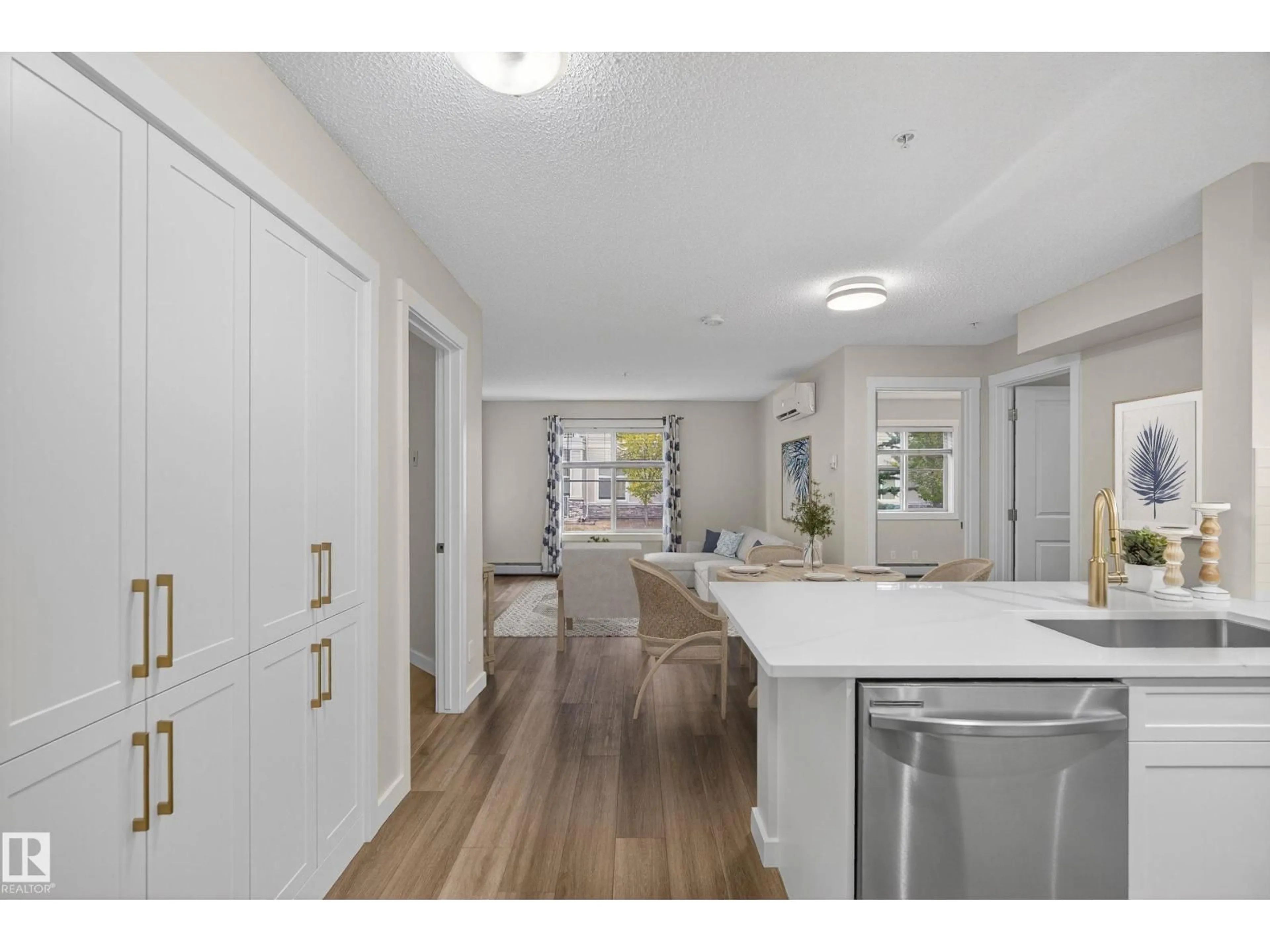 Open concept kitchen, unknown for #109 - 5804 MULLEN PL, Edmonton Alberta T6R0W3