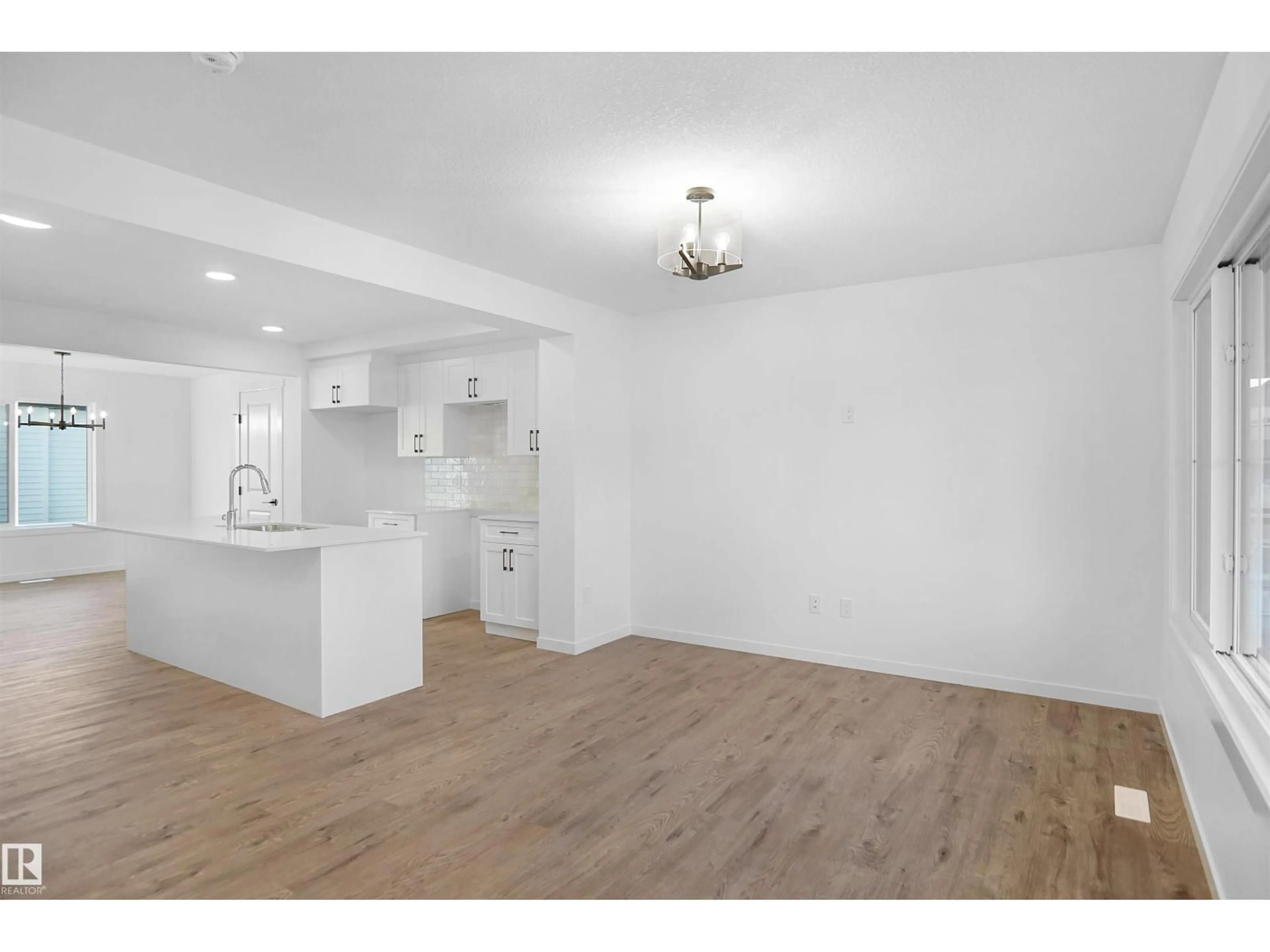 Open concept kitchen, wood/laminate floor for 244 SAVOY CR, Sherwood Park Alberta T8H0Z5