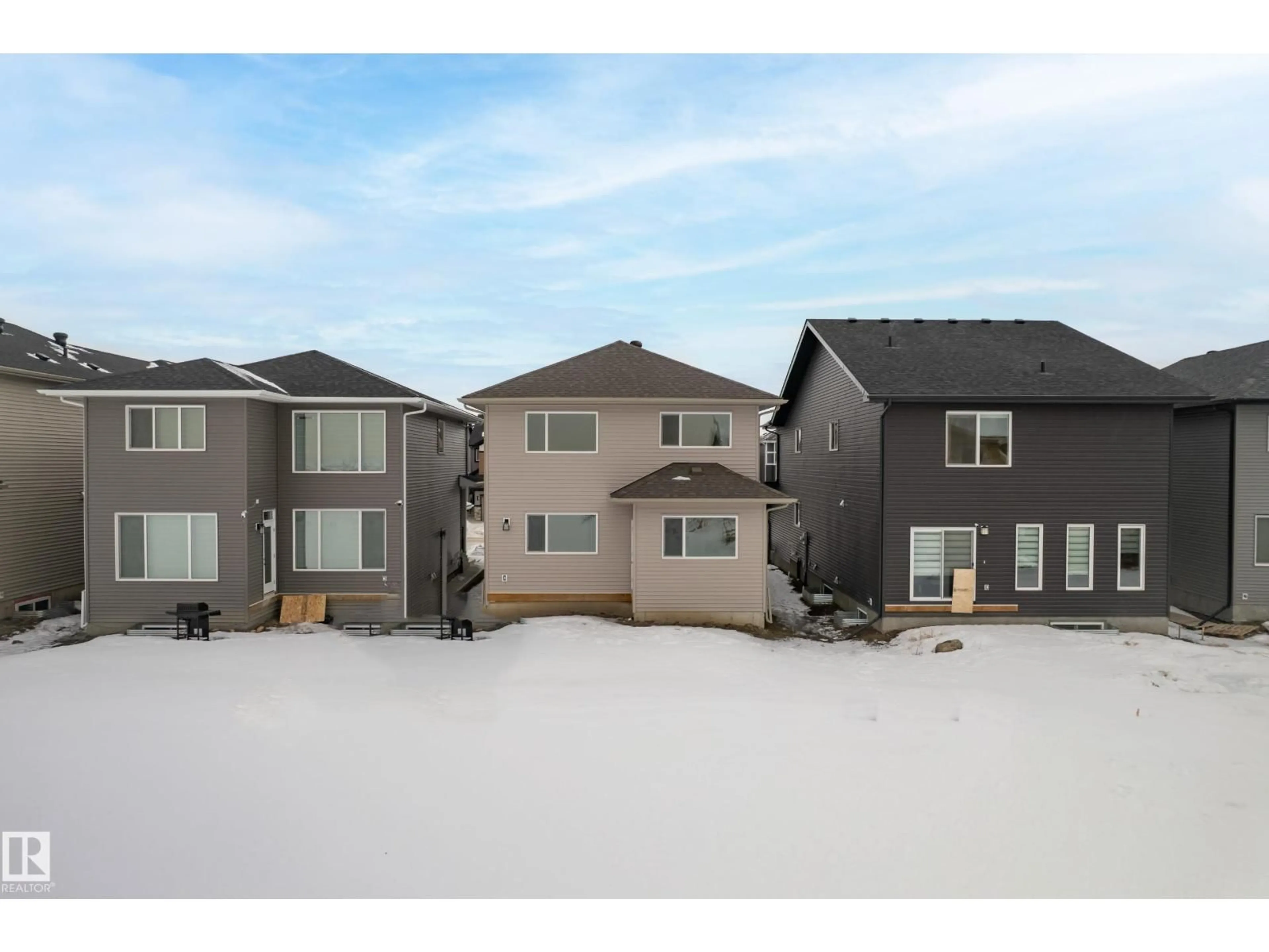 A pic from outside/outdoor area/front of a property/back of a property/a pic from drone, unknown for NW - 7015 177 AV, Edmonton Alberta T5Z0W8