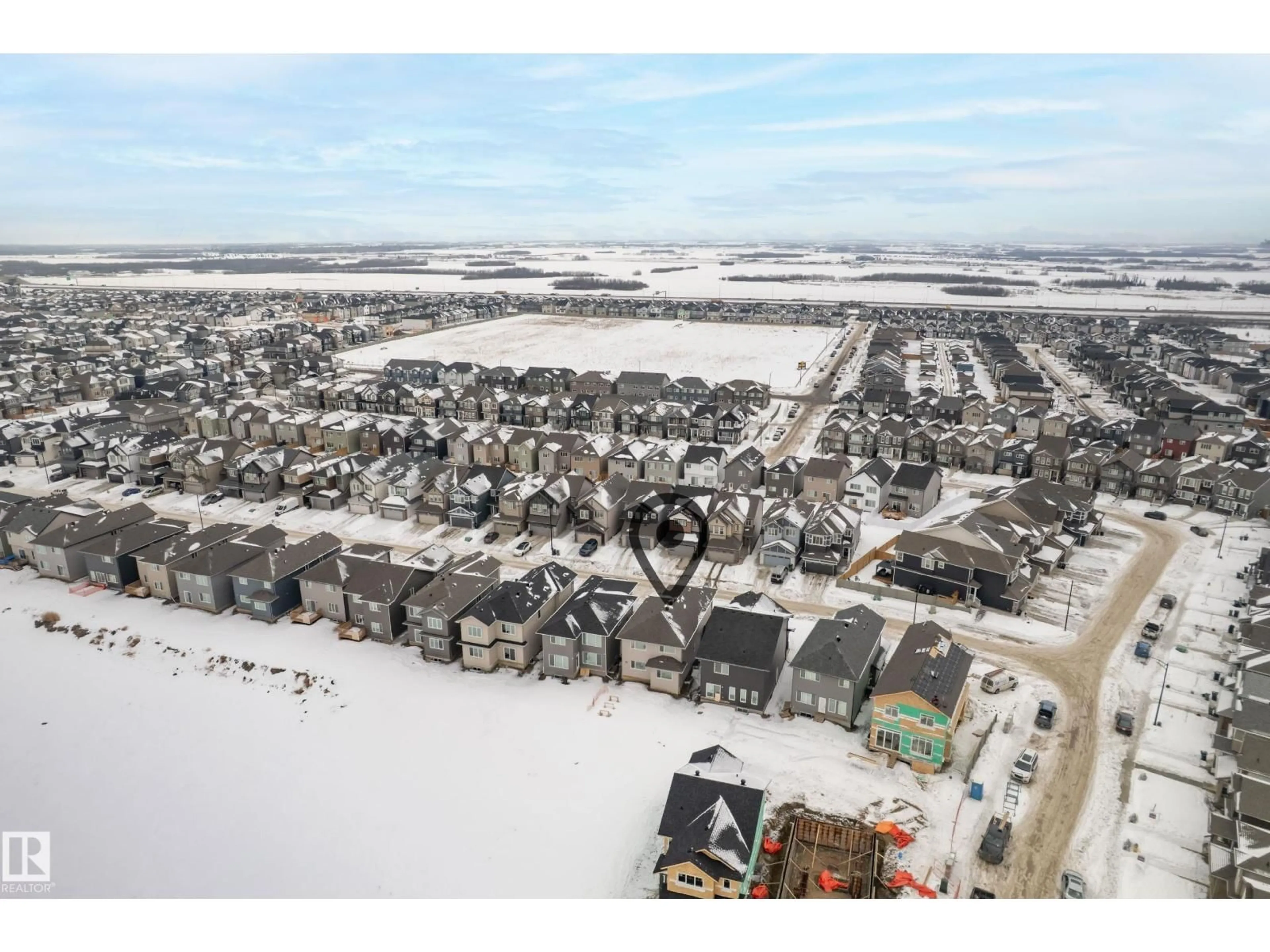 A pic from outside/outdoor area/front of a property/back of a property/a pic from drone, unknown for NW - 7015 177 AV, Edmonton Alberta T5Z0W8