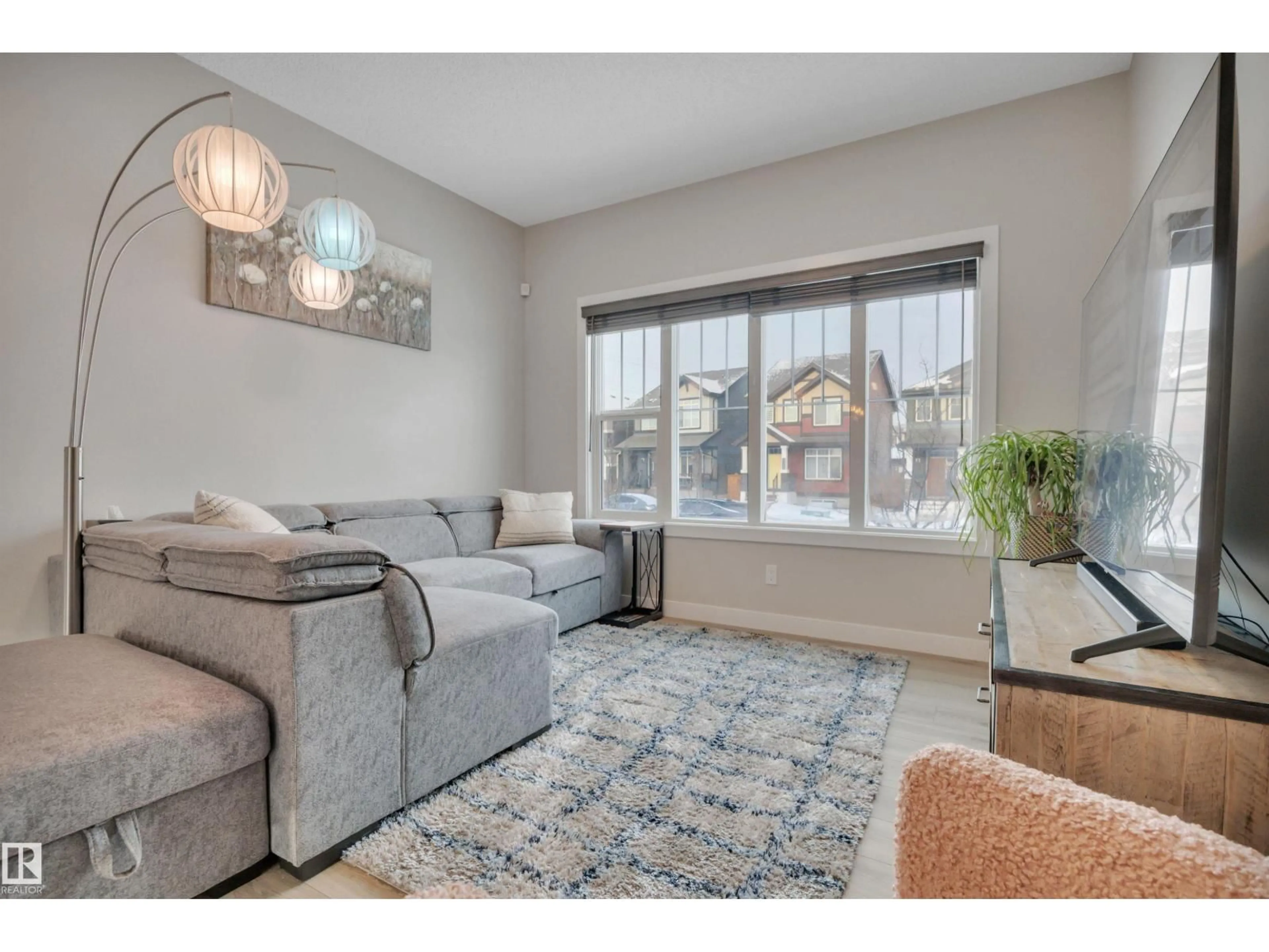 Living room with furniture, unknown for 8021 ORCHARDS GR SW, Edmonton Alberta T6X2L5