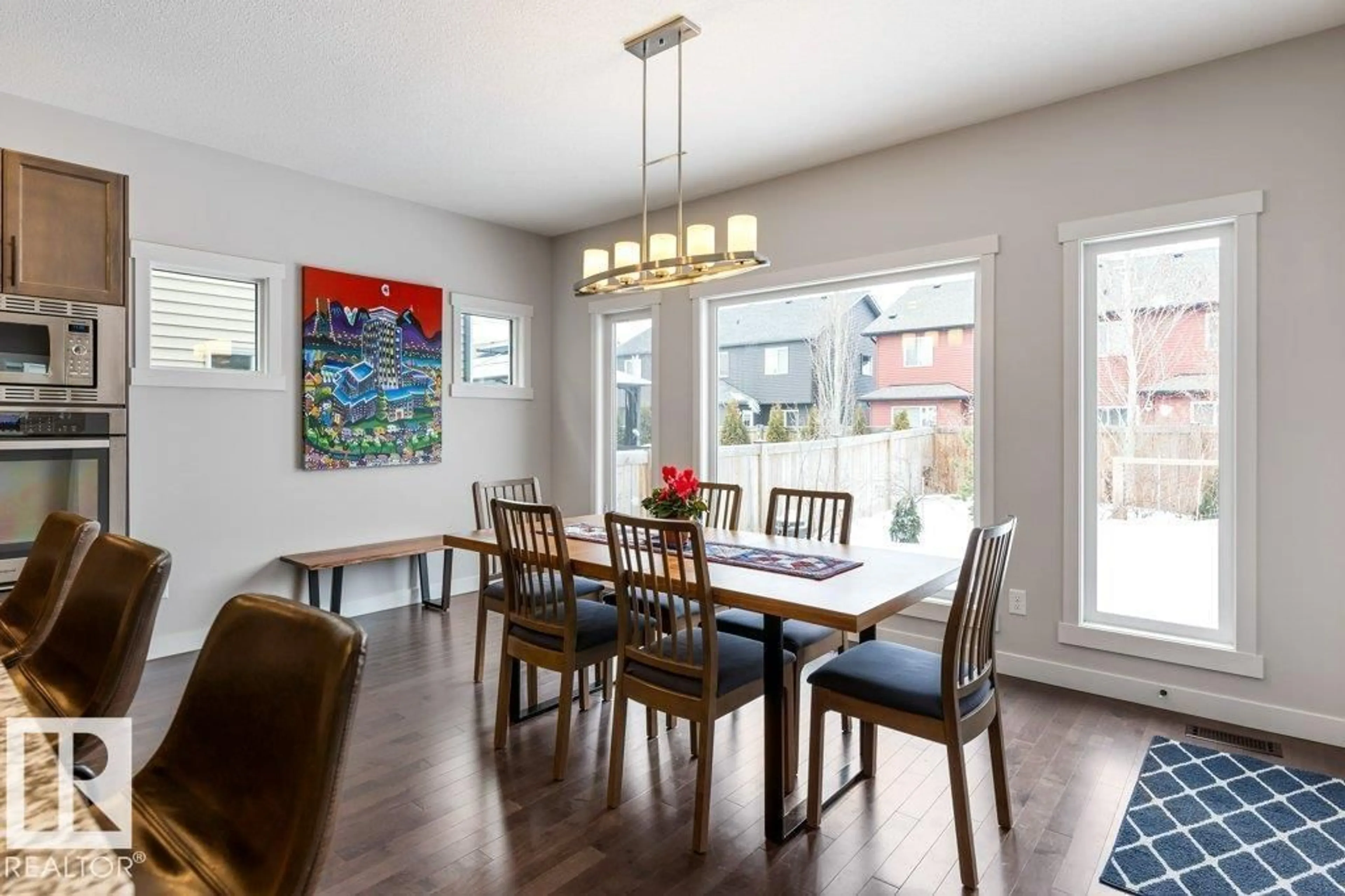 Dining room, wood/laminate floor for 562 MERLIN LANDING LD, Edmonton Alberta T5S0L9