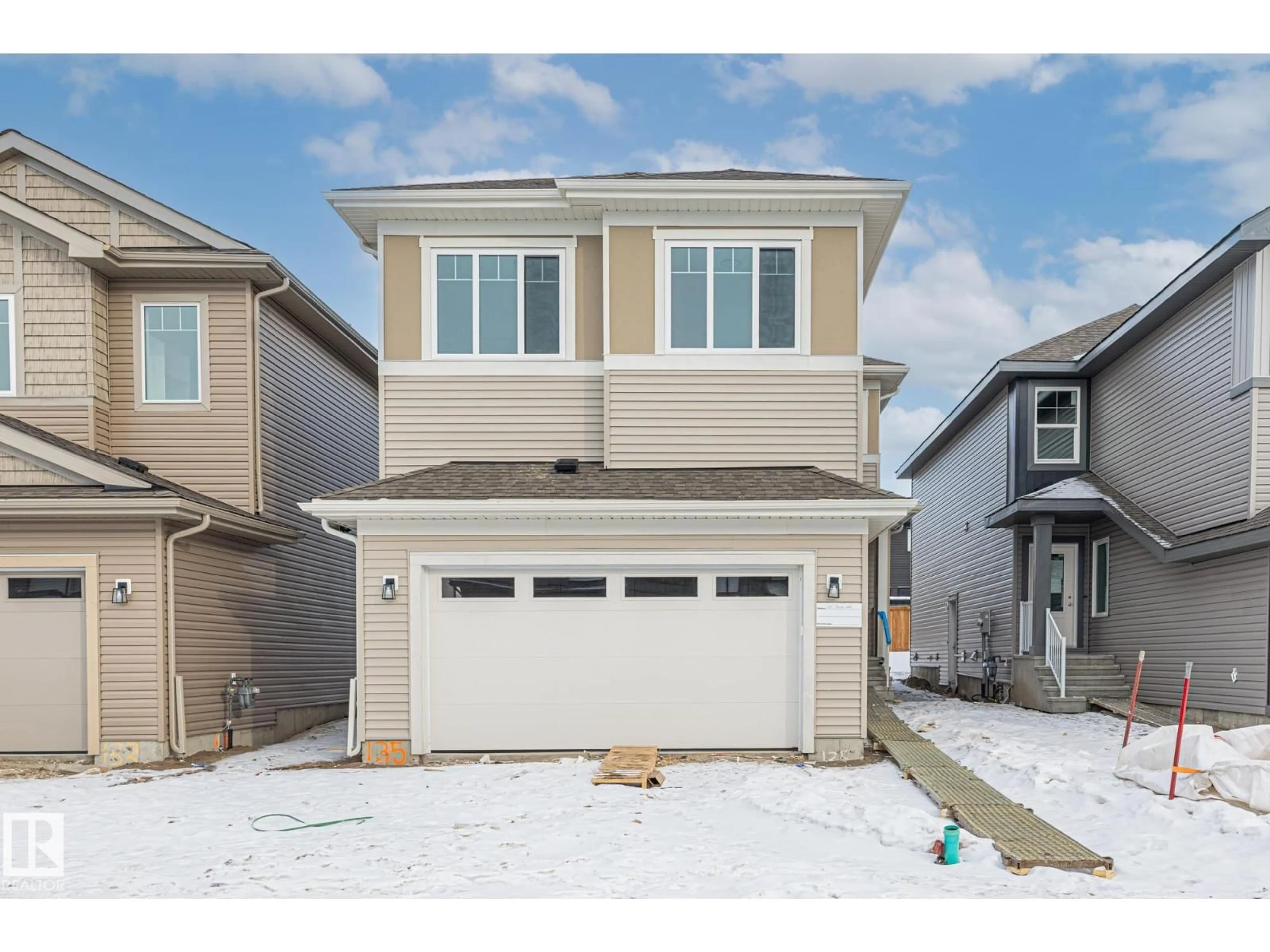 Home with vinyl exterior material, street for 135 FICUS WY, Fort Saskatchewan Alberta T8L1X8