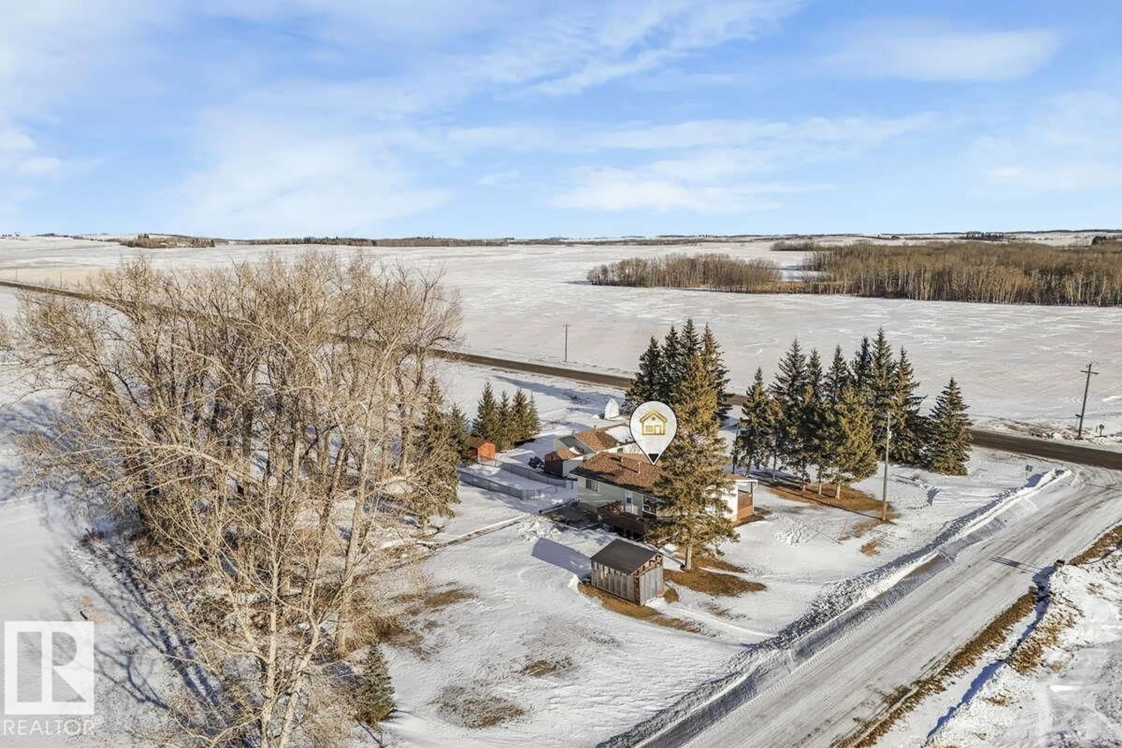 A pic from outside/outdoor area/front of a property/back of a property/a pic from drone, water/lake/river/ocean view for 441002 HWY 822, Rural Wetaskiwin County Alberta T9A1W9