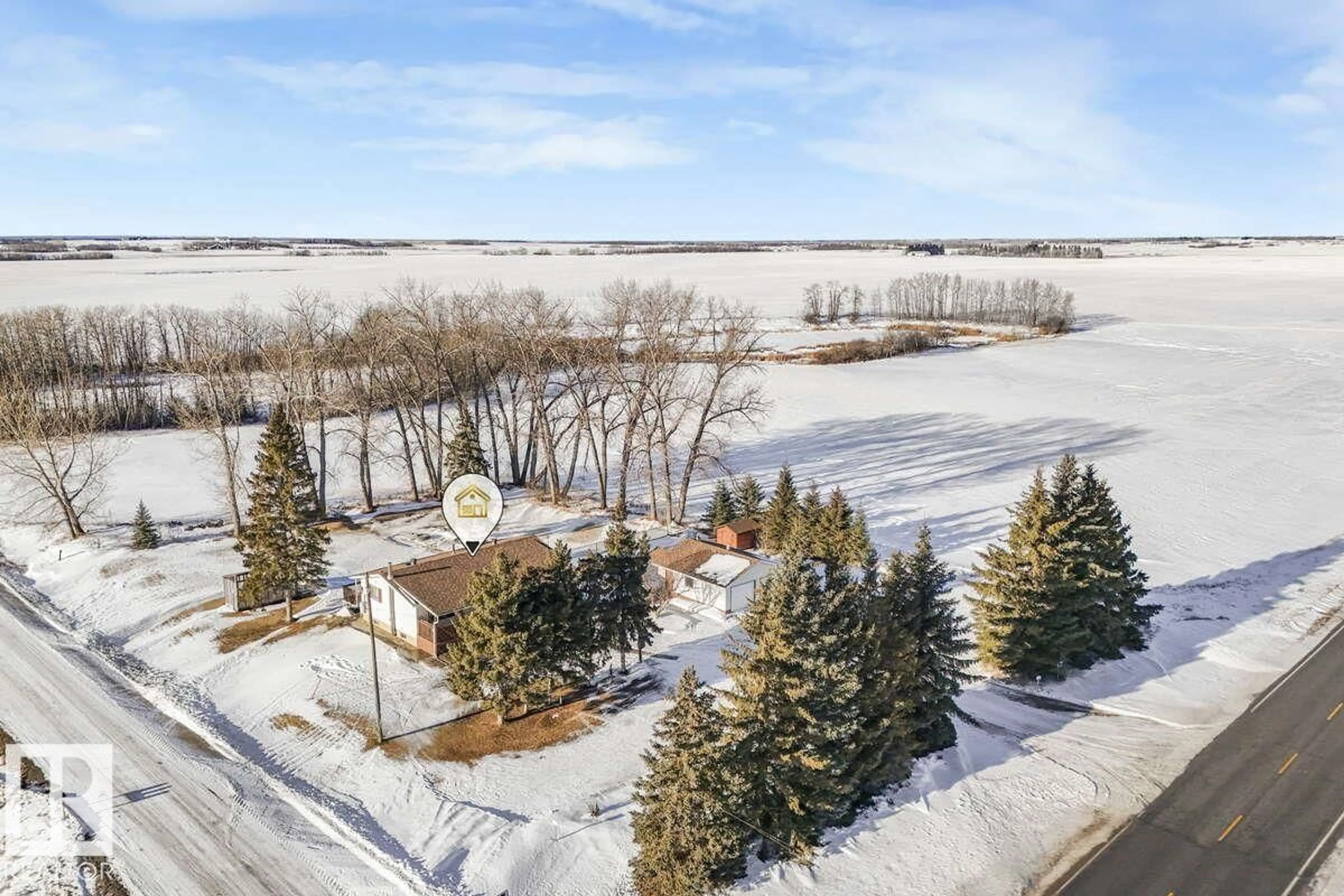 A pic from outside/outdoor area/front of a property/back of a property/a pic from drone, water/lake/river/ocean view for 441002 HWY 822, Rural Wetaskiwin County Alberta T9A1W9