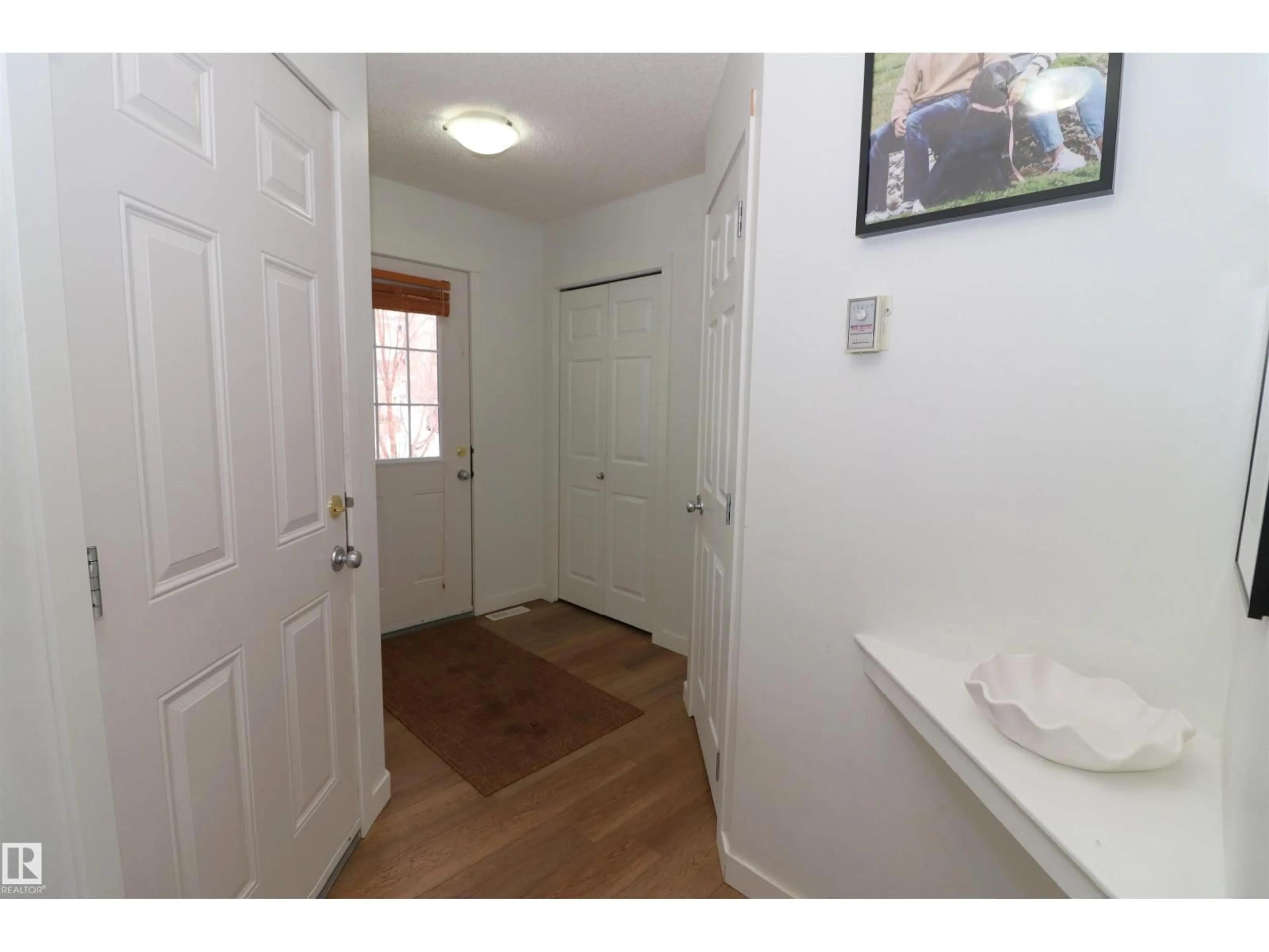 Indoor entryway for 120 - 75 MAGRATH RD, Edmonton Alberta T6R0C6