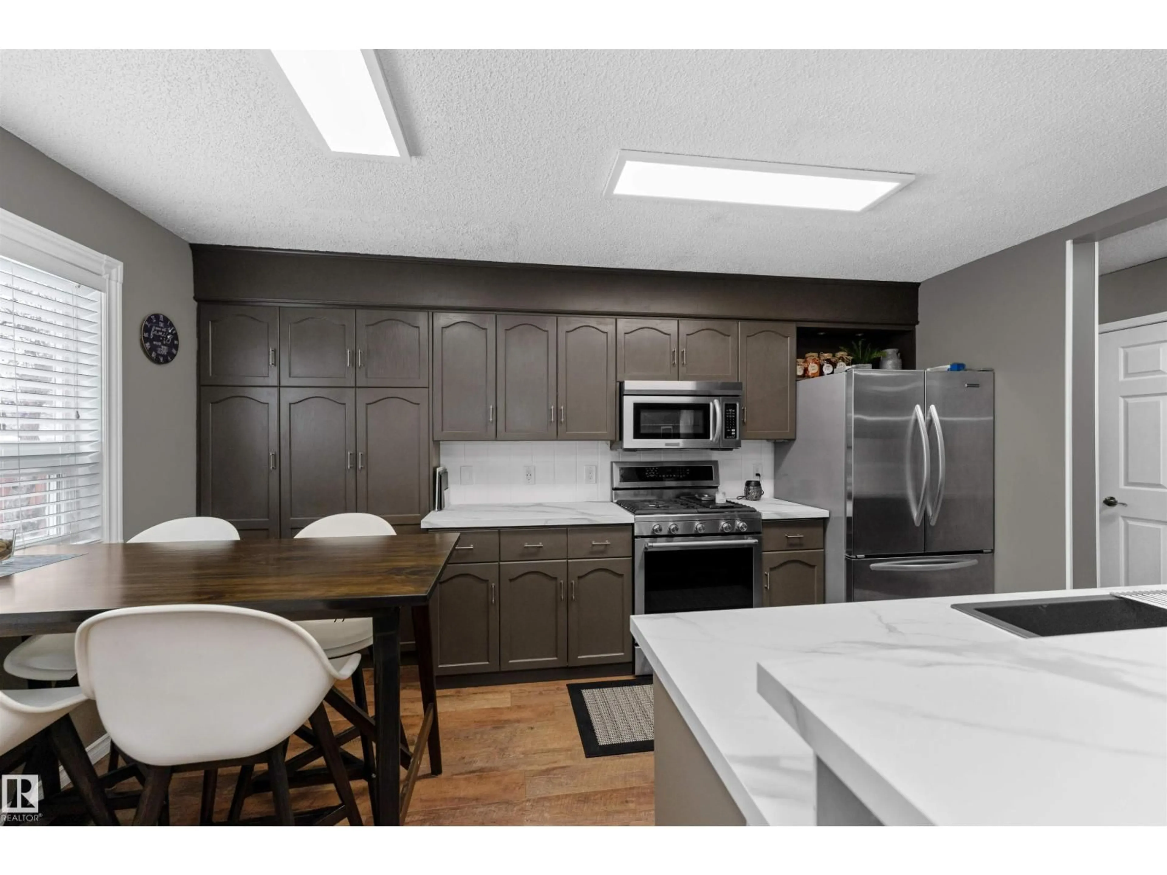 Open concept kitchen, unknown for NW - 5628 188A ST, Edmonton Alberta T6M2G7