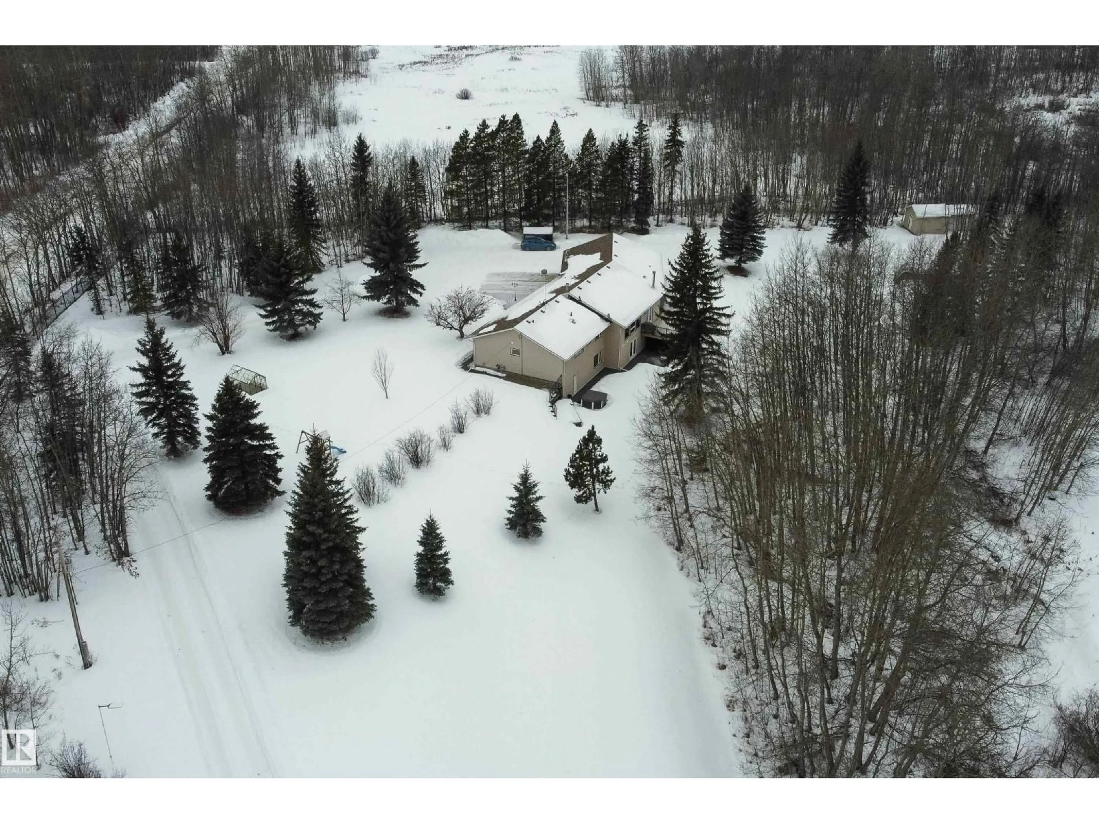 A pic from outside/outdoor area/front of a property/back of a property/a pic from drone, unknown for 21440 TWP ROAD 534, Rural Strathcona County Alberta T8E2C1
