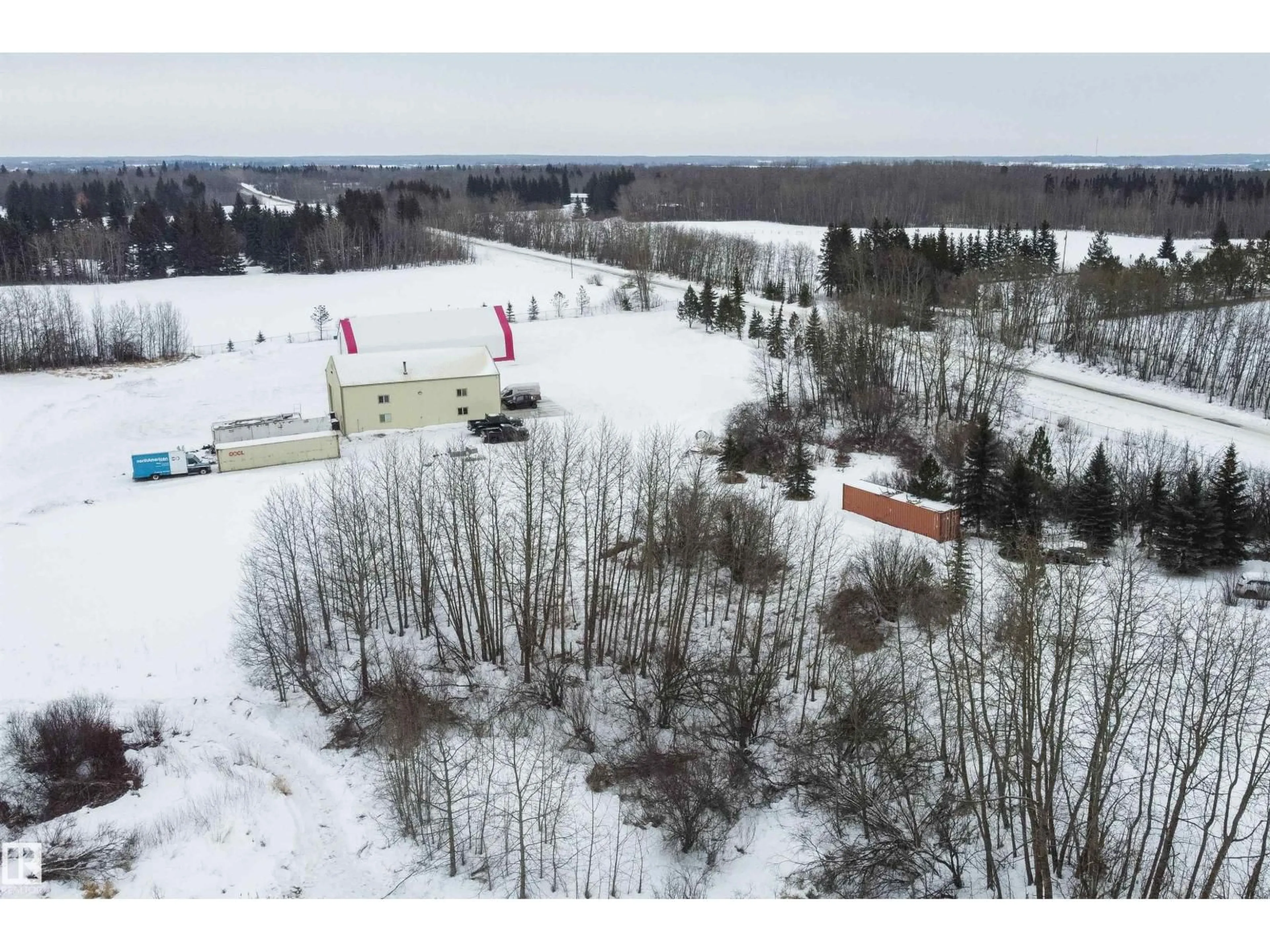 A pic from outside/outdoor area/front of a property/back of a property/a pic from drone, unknown for 21440 TWP ROAD 534, Rural Strathcona County Alberta T8E2C1
