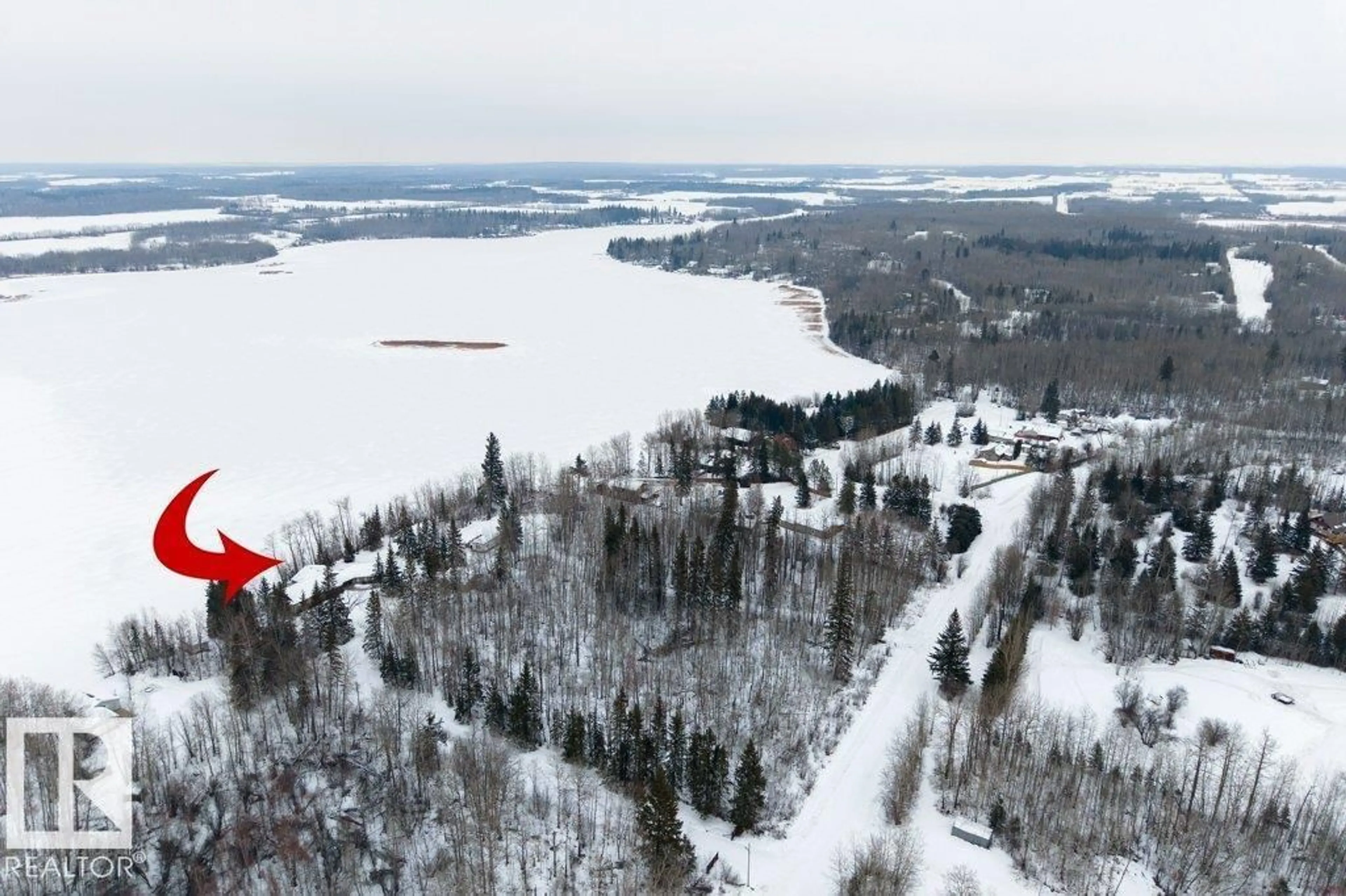 A pic from outside/outdoor area/front of a property/back of a property/a pic from drone, water/lake/river/ocean view for #18 - 2120 TWP ROAD 565, Rural Lac Ste. Anne County Alberta T0E1V0