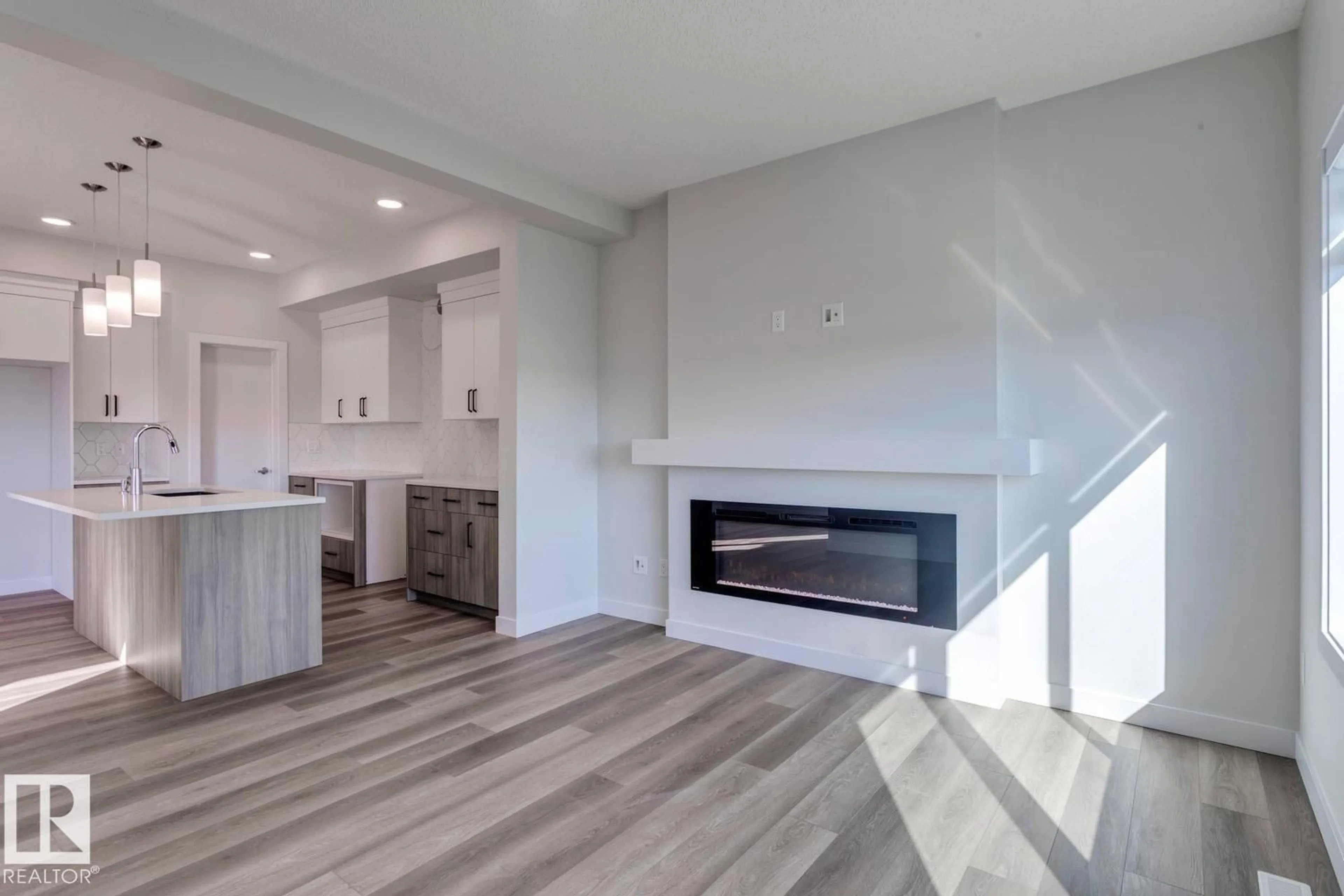 Open concept kitchen, unknown for NW - 19007 20 AV, Edmonton Alberta T6M3E8