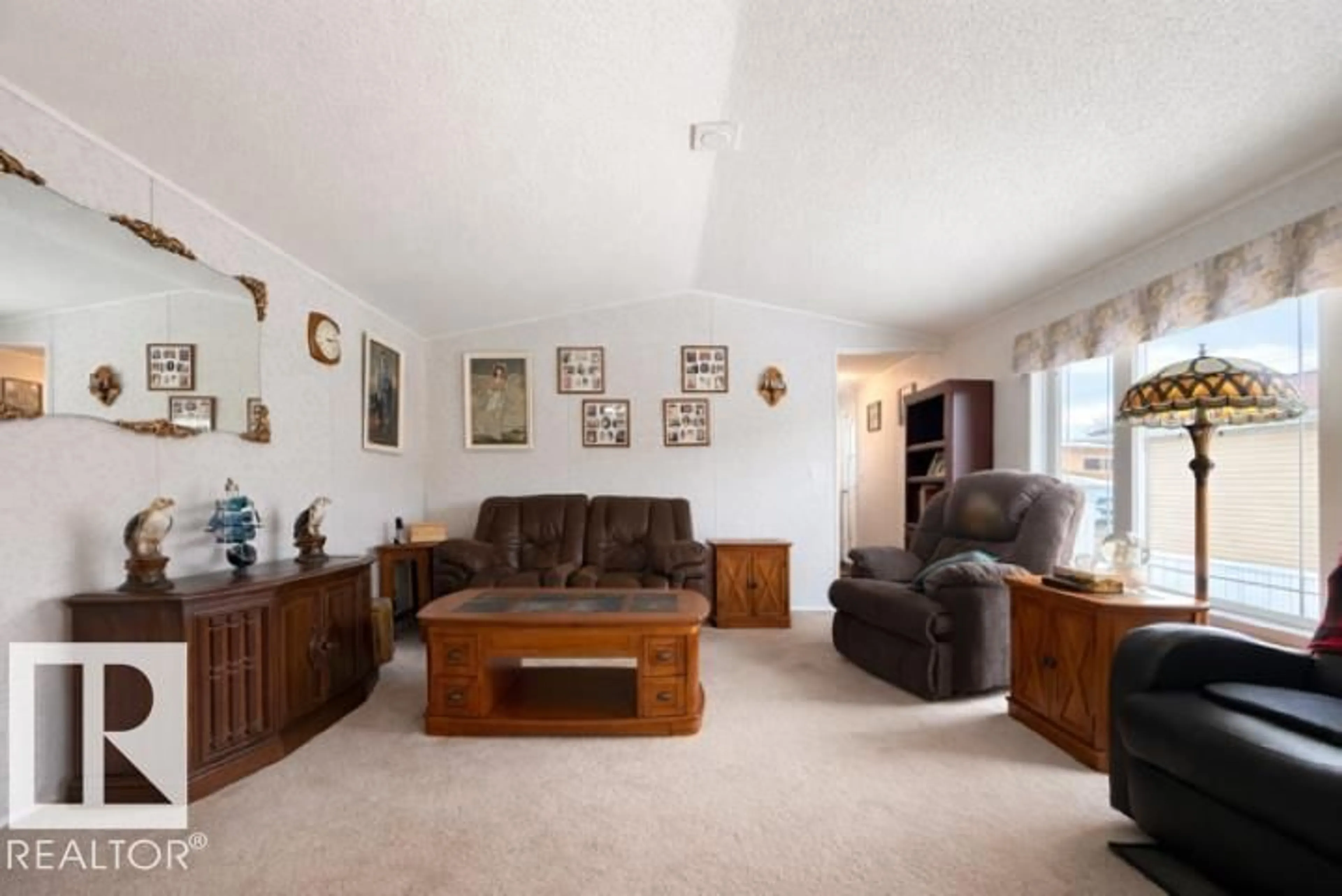 Living room with furniture, unknown for 4805 49 AV, Wetaskiwin Alberta T9A0G5