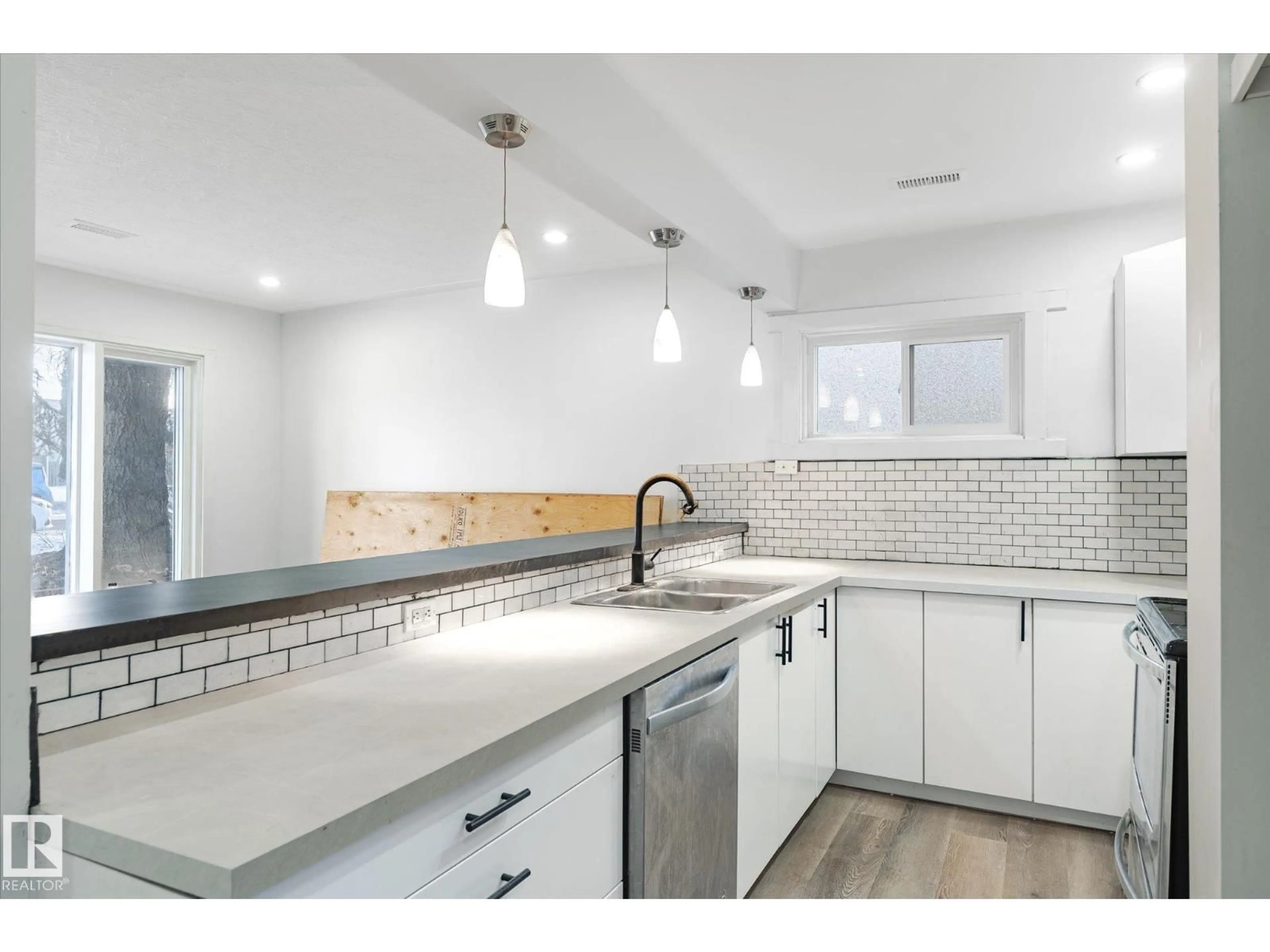 Open concept kitchen, ceramic/tile floor for 12034 37 ST, Edmonton Alberta T5W2C3