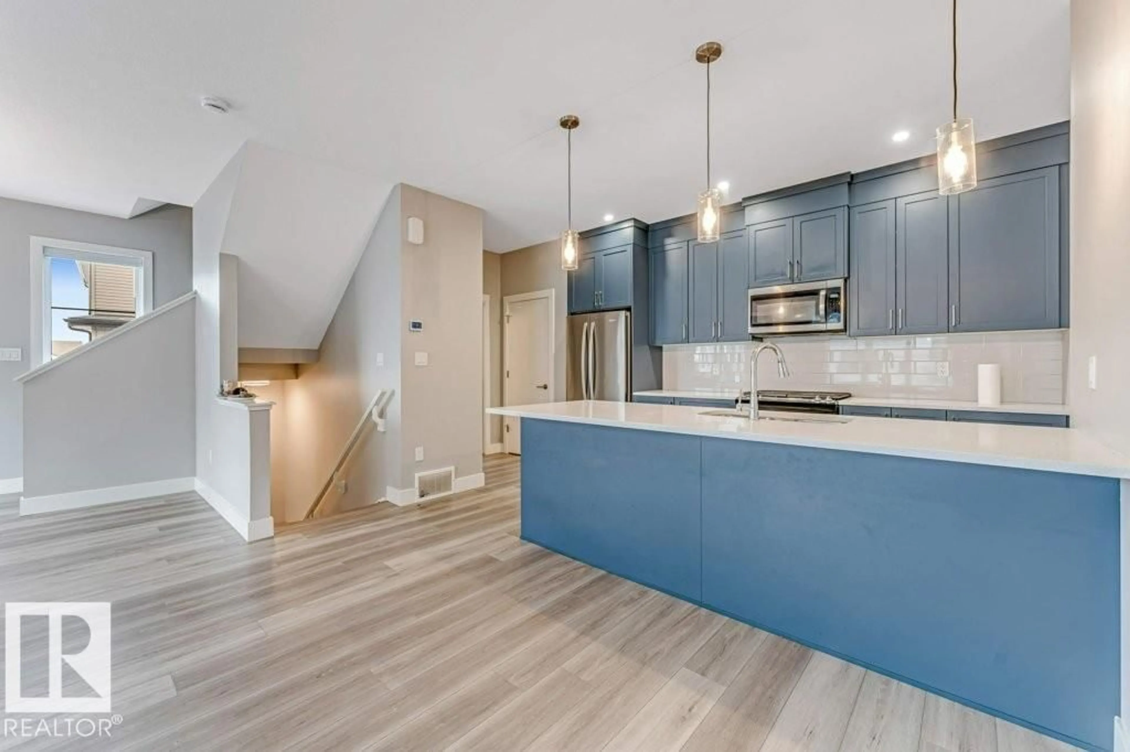 Open concept kitchen, unknown for 70 6905 25 AV SW, Edmonton Alberta T6X3B7