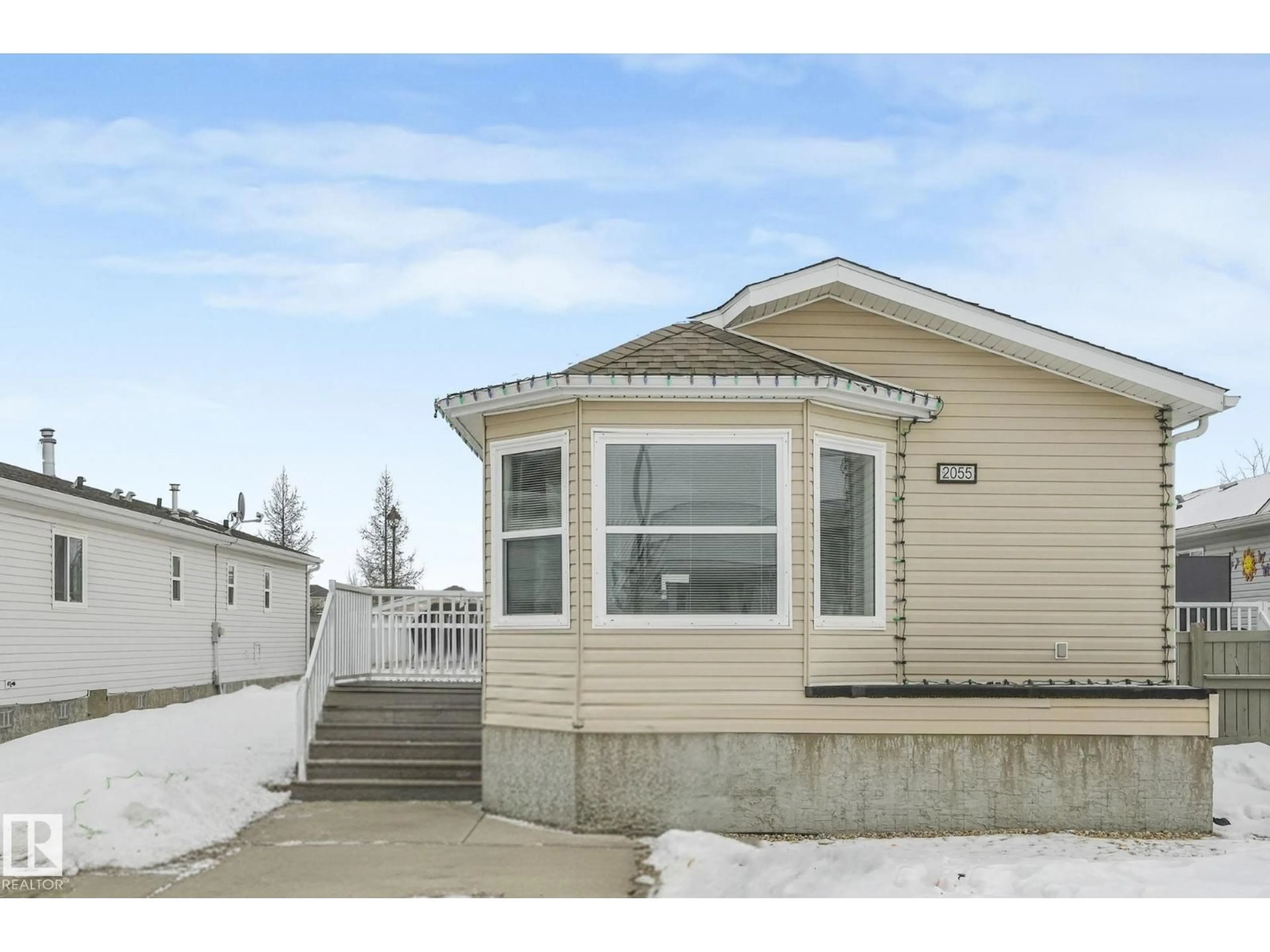 Home with vinyl exterior material, street for 2055 ASPEN CR, Leduc Alberta T9E8R5