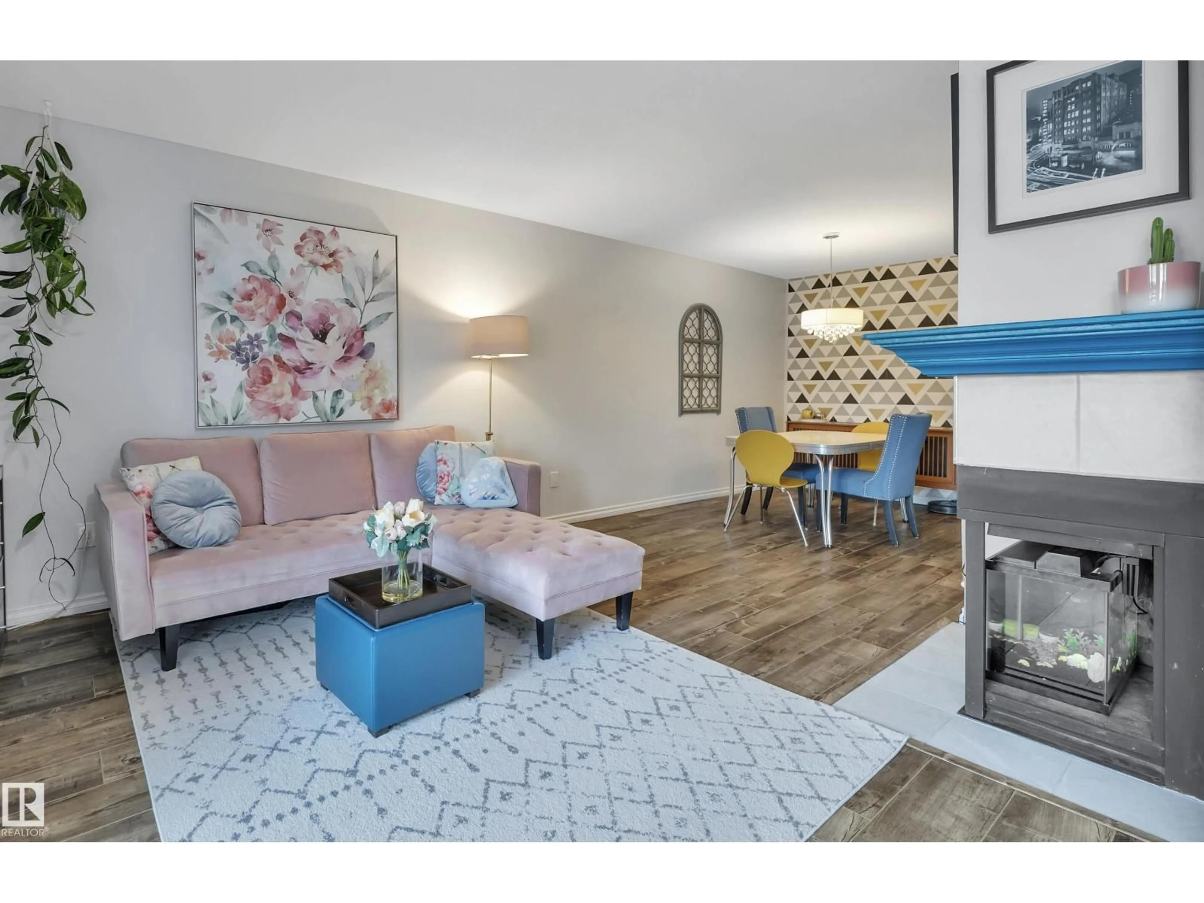 Living room with furniture, wood/laminate floor for 5926 172 ST, Edmonton Alberta T6M1B4