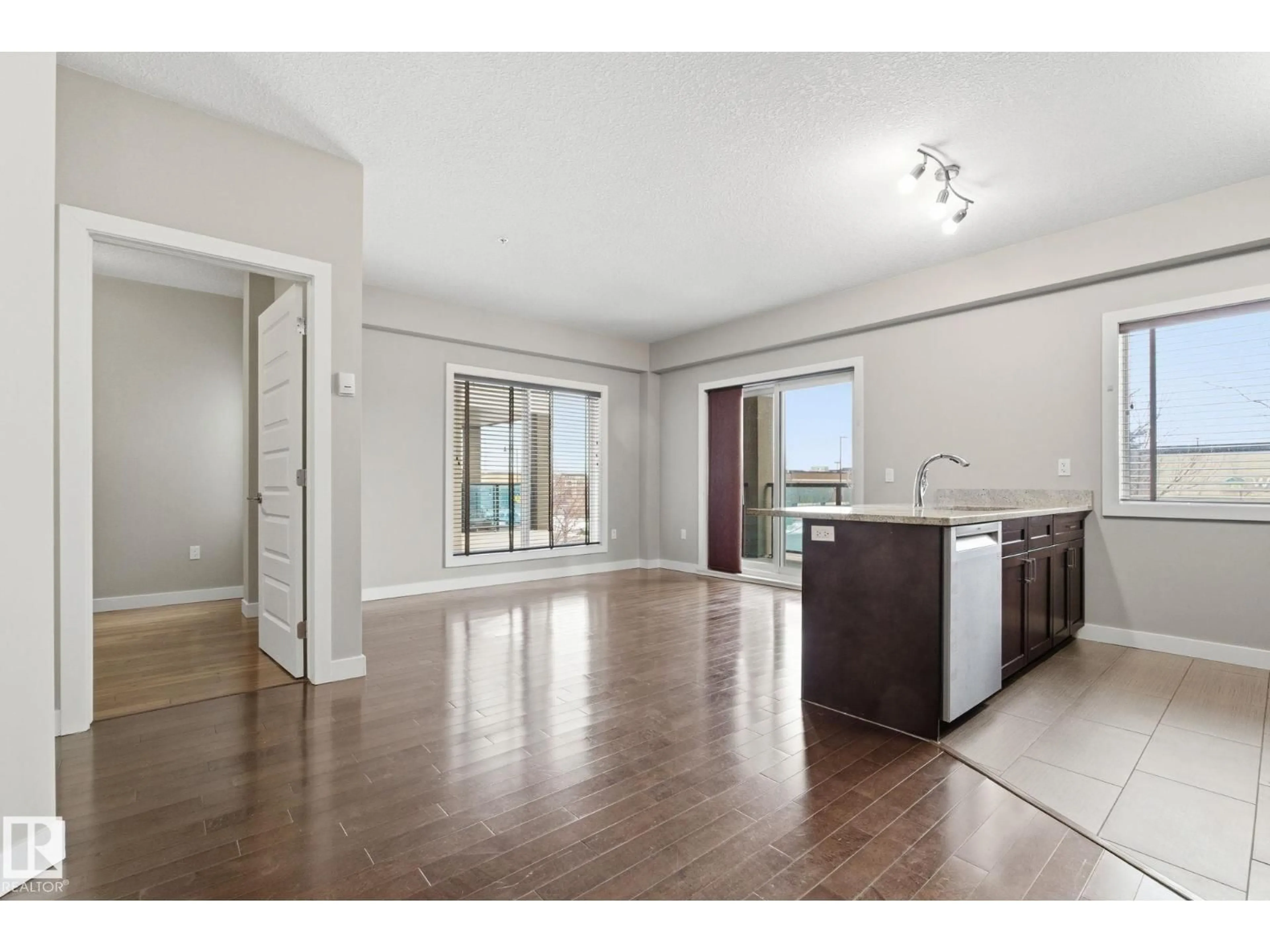 Open concept kitchen, unknown for #214 - 1238 WINDERMERE WY, Edmonton Alberta T6W2J3