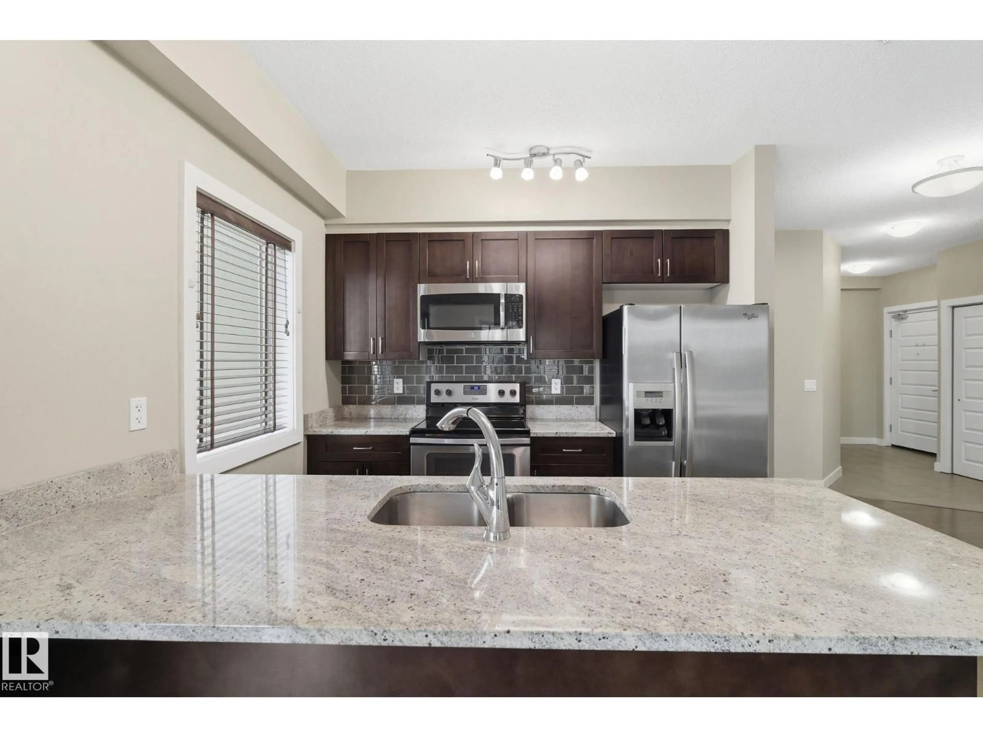 Open concept kitchen, ceramic/tile floor for #214 - 1238 WINDERMERE WY, Edmonton Alberta T6W2J3