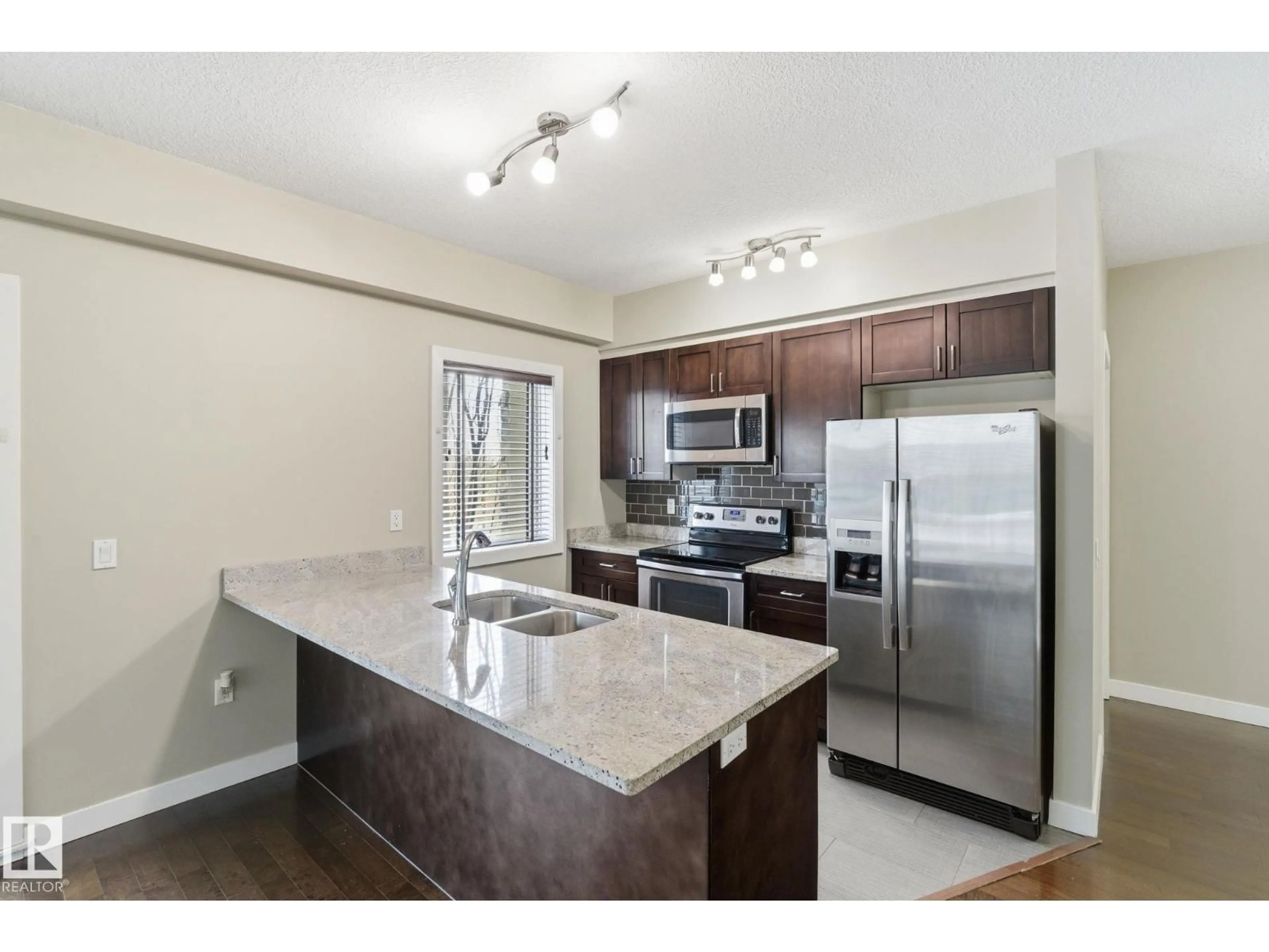 Open concept kitchen, unknown for #214 - 1238 WINDERMERE WY, Edmonton Alberta T6W2J3